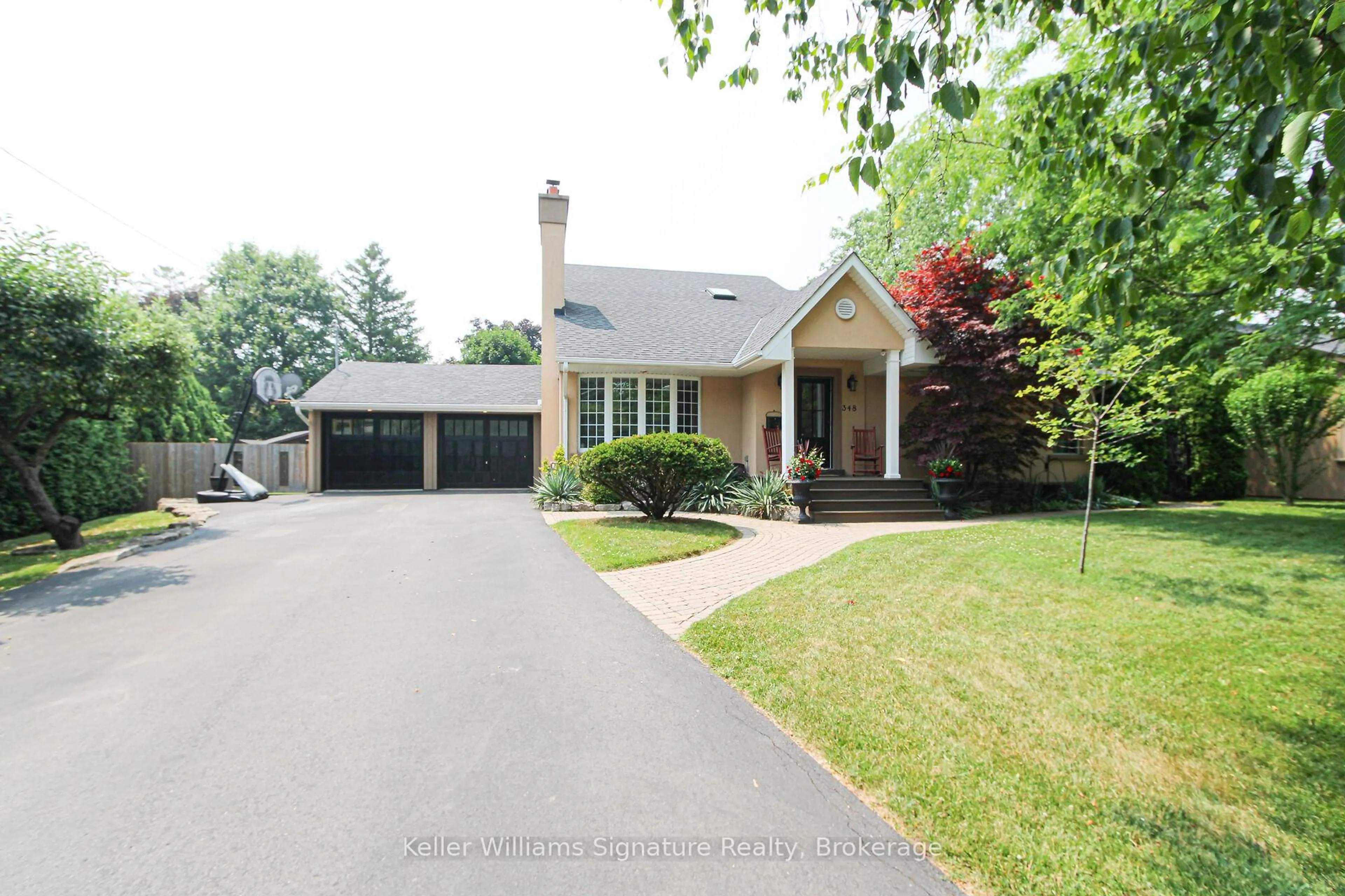 Home with brick exterior material, street for 348 Sandhurst Dr, Oakville Ontario L6L 3Y6
