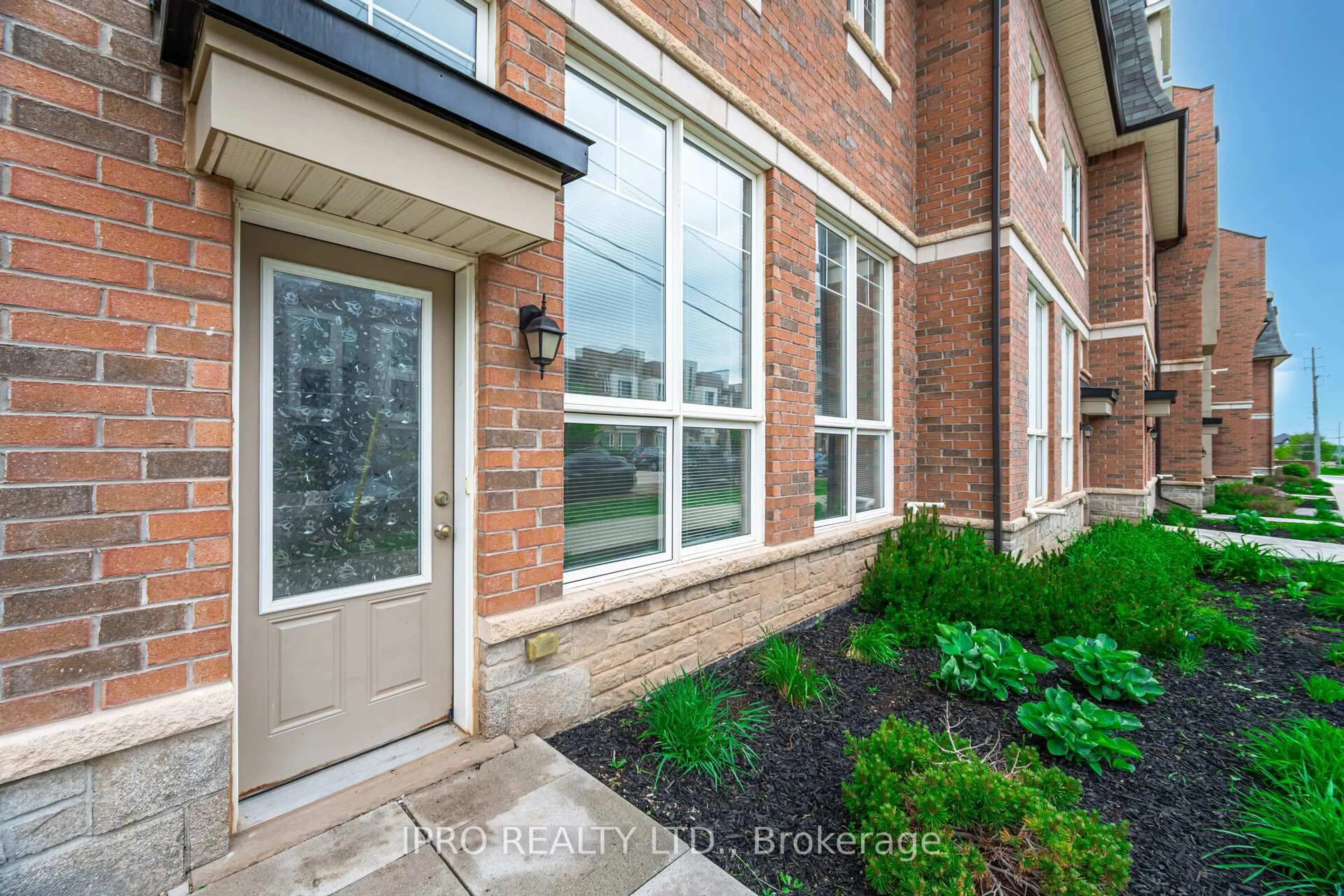 Home with brick exterior material, street for 2420 Baronwood Dr #4301, Oakville Ontario L6M 0X6