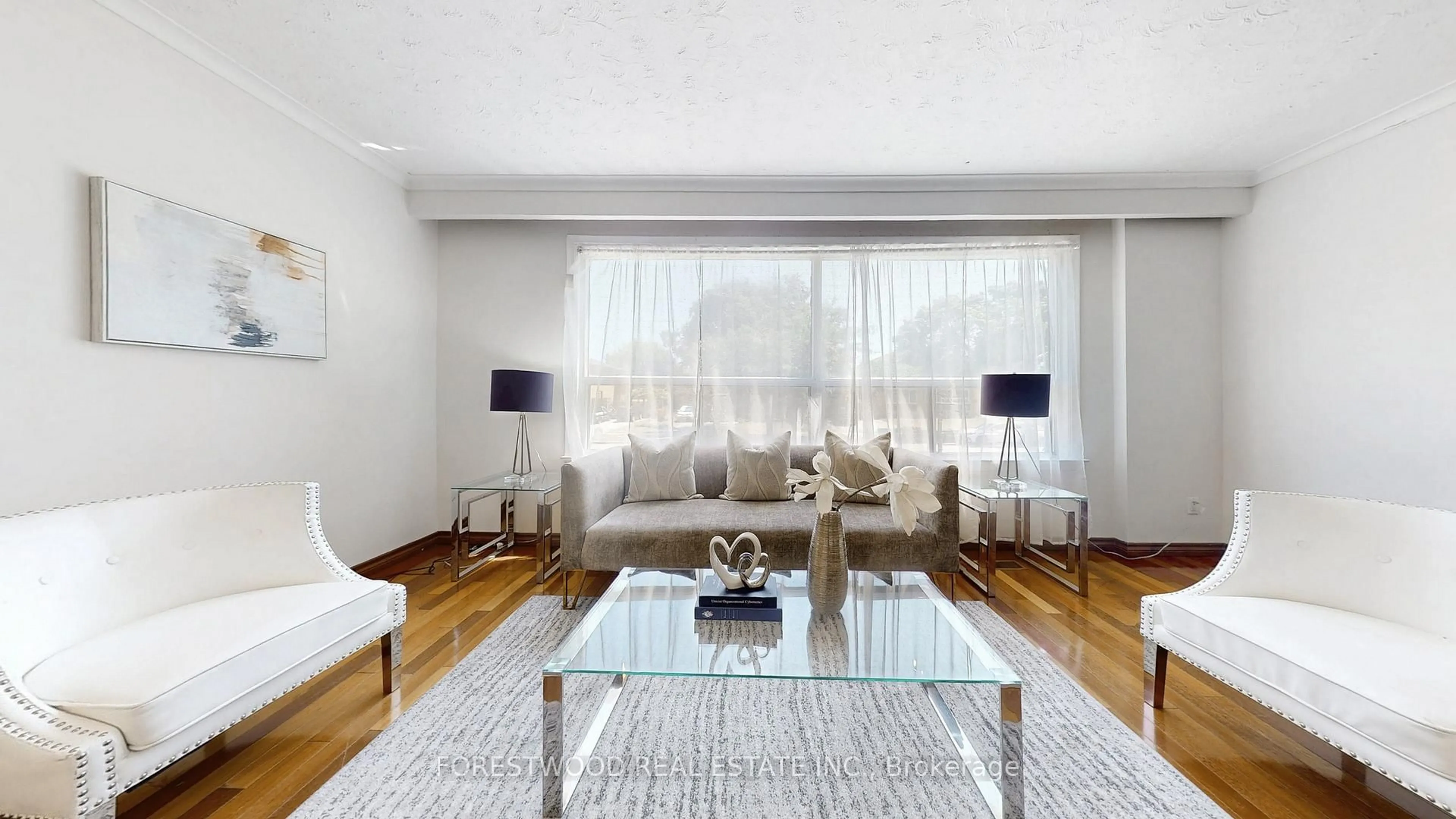 Living room with furniture, wood/laminate floor for 2185 Wiseman Crt, Mississauga Ontario L5J 1P3