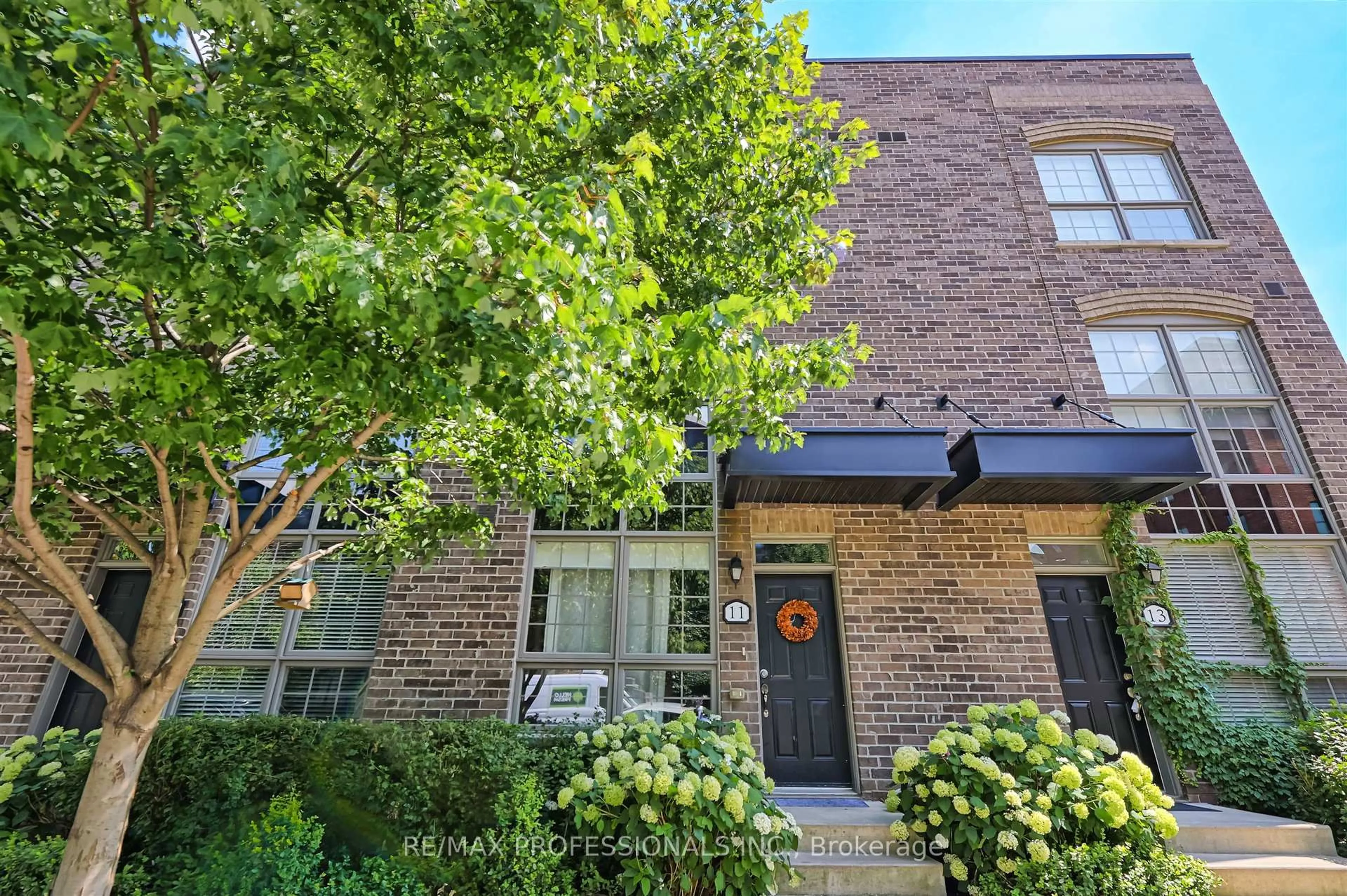 Home with brick exterior material, street for 11 Powerhouse St, Toronto Ontario M6H 4K4