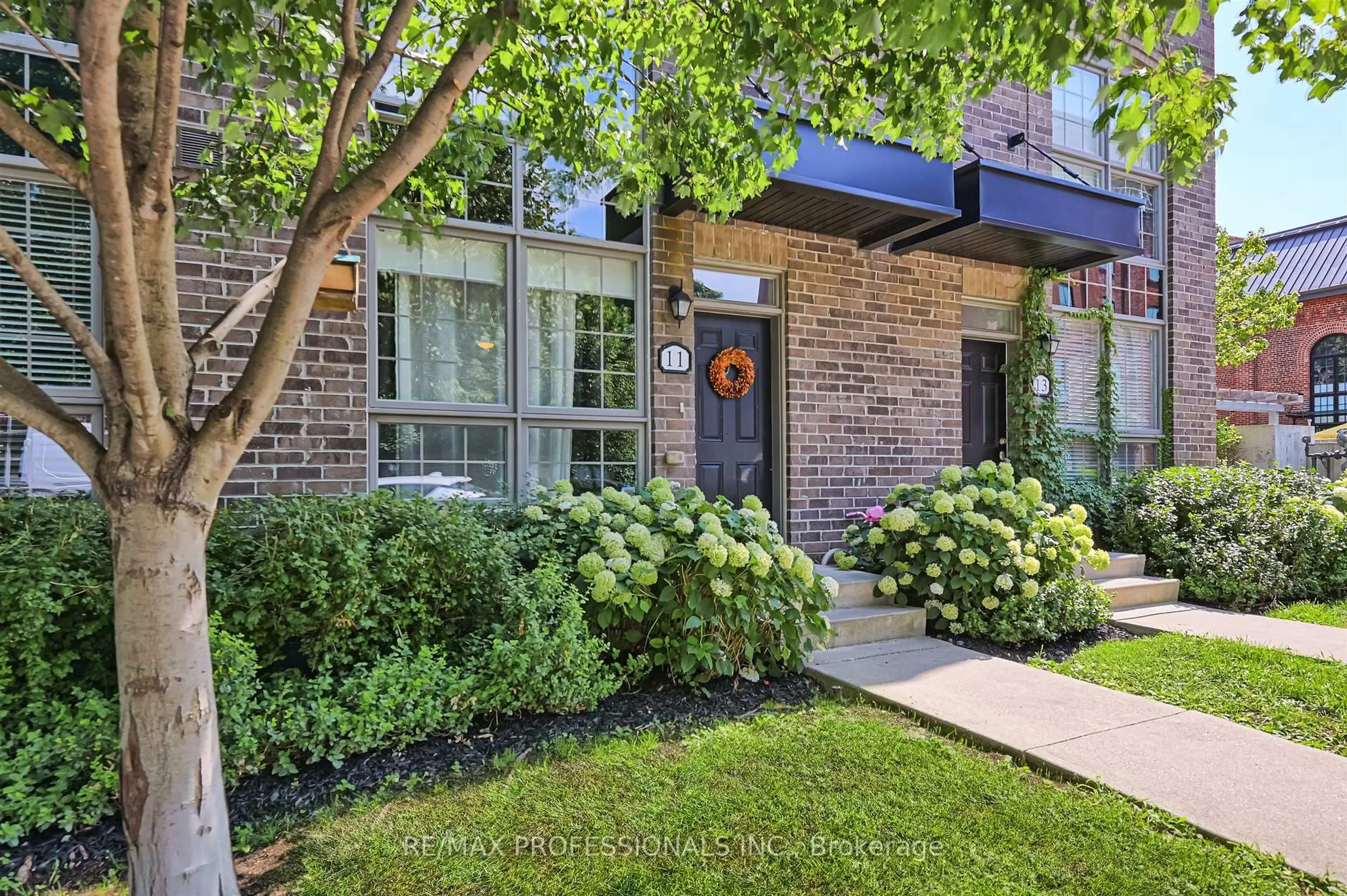 Home with brick exterior material, street for 11 Powerhouse St, Toronto Ontario M6H 4K4