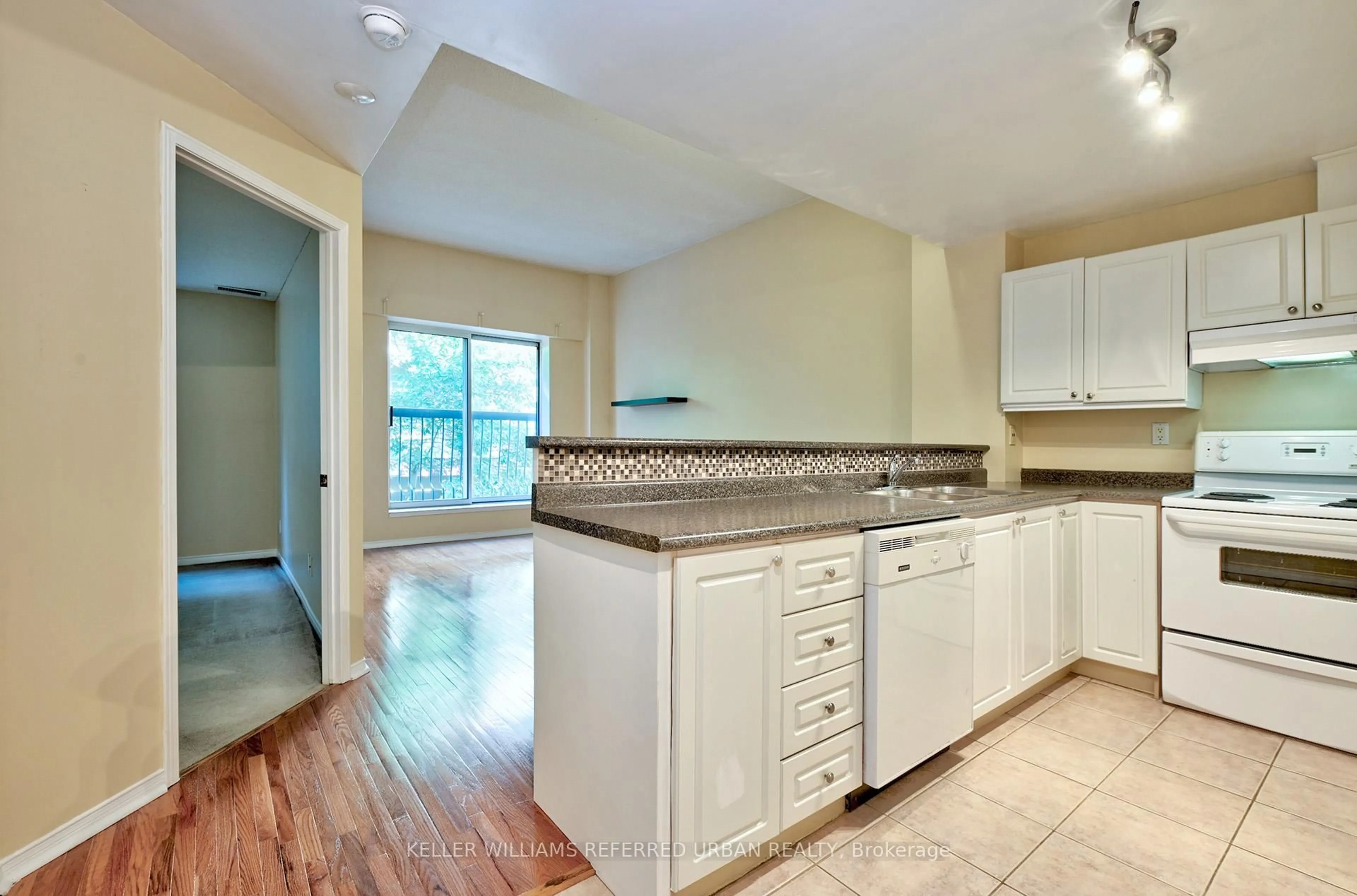 Open concept kitchen, ceramic/tile floor for 4198 Dundas St #210, Toronto Ontario M8X 1Y6