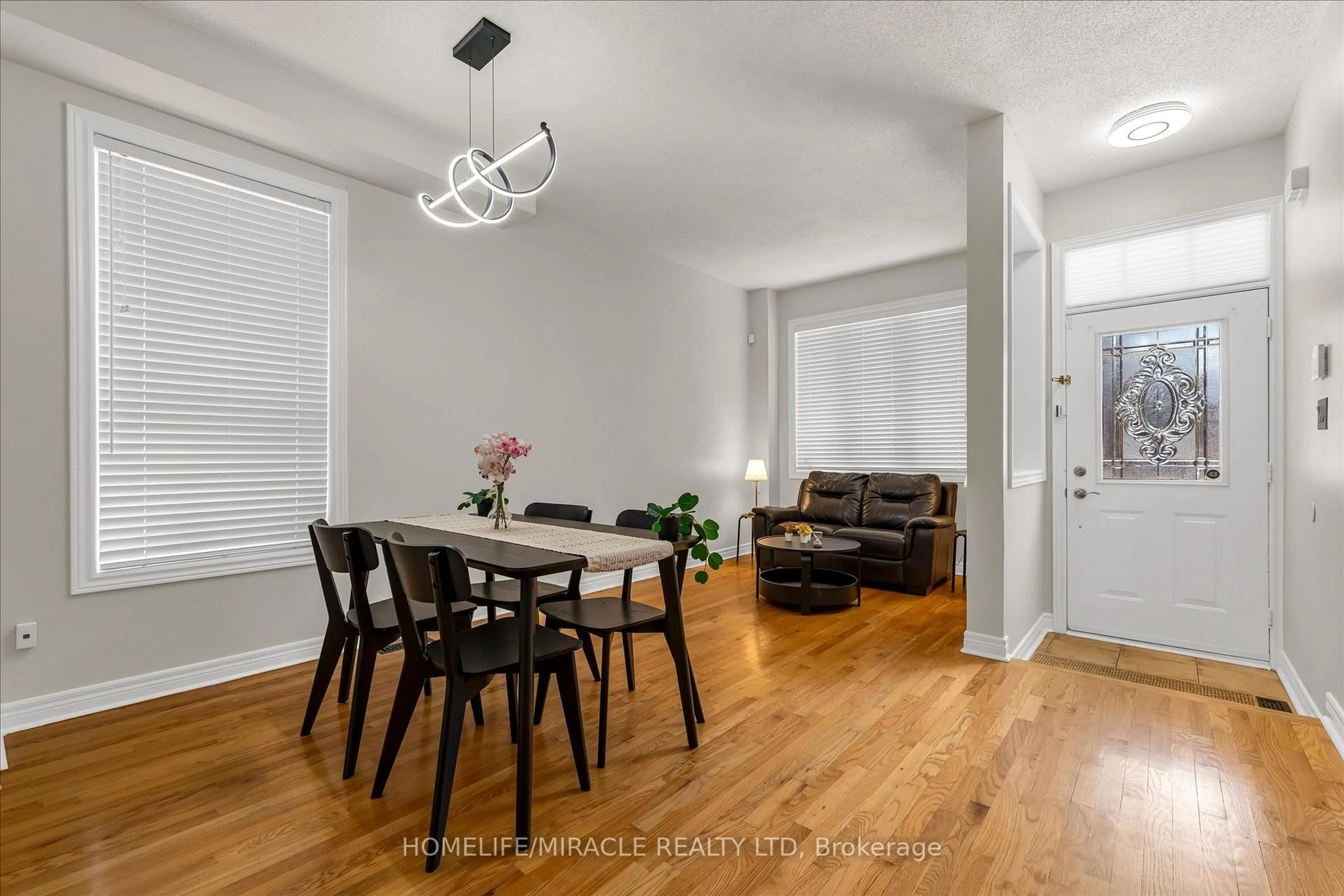 Dining room, wood/laminate floor for 4811 James Austin Dr, Mississauga Ontario L4Z 4H4
