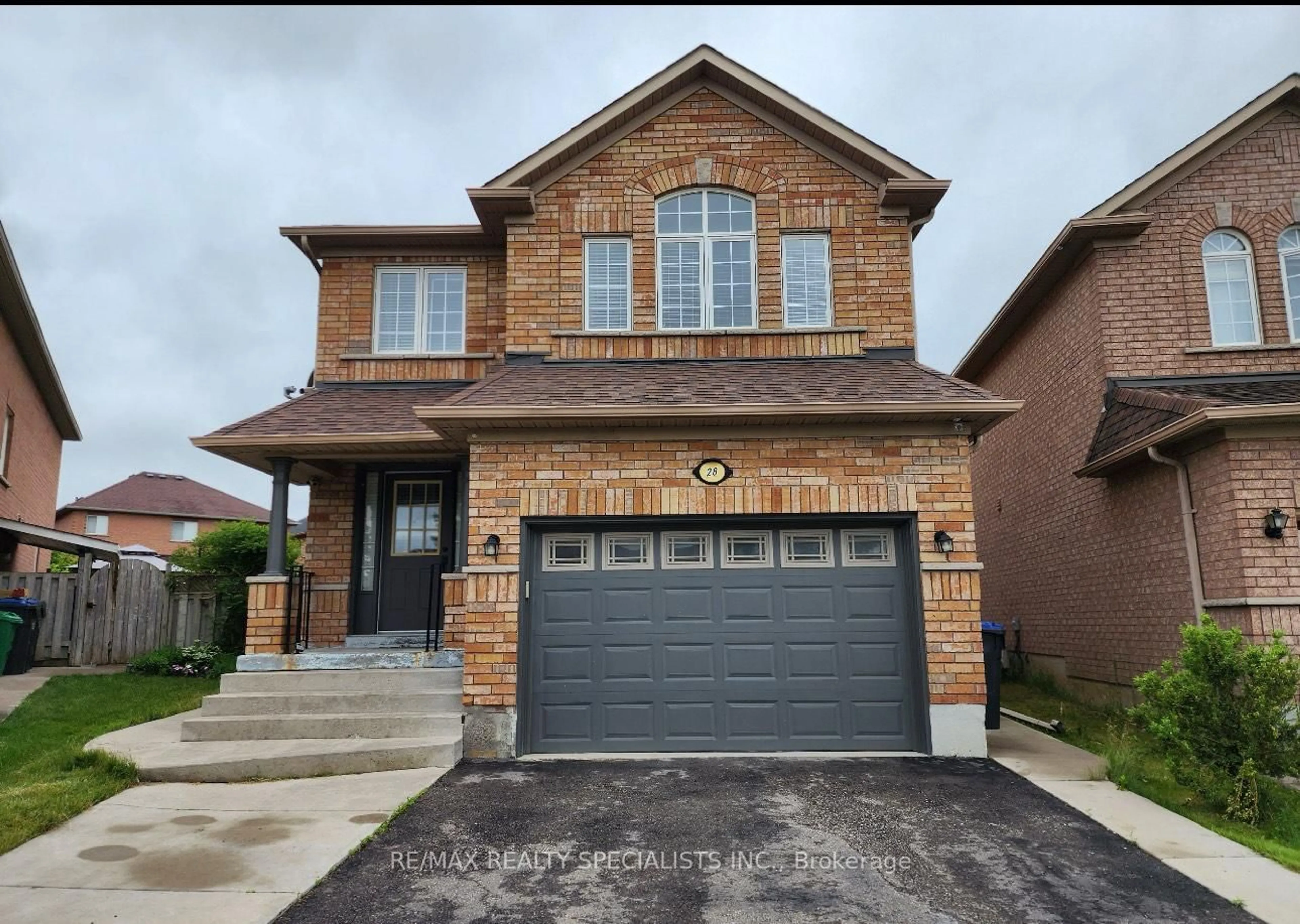 Home with brick exterior material, street for 28 Serenity Lane, Brampton Ontario L6R 2T1