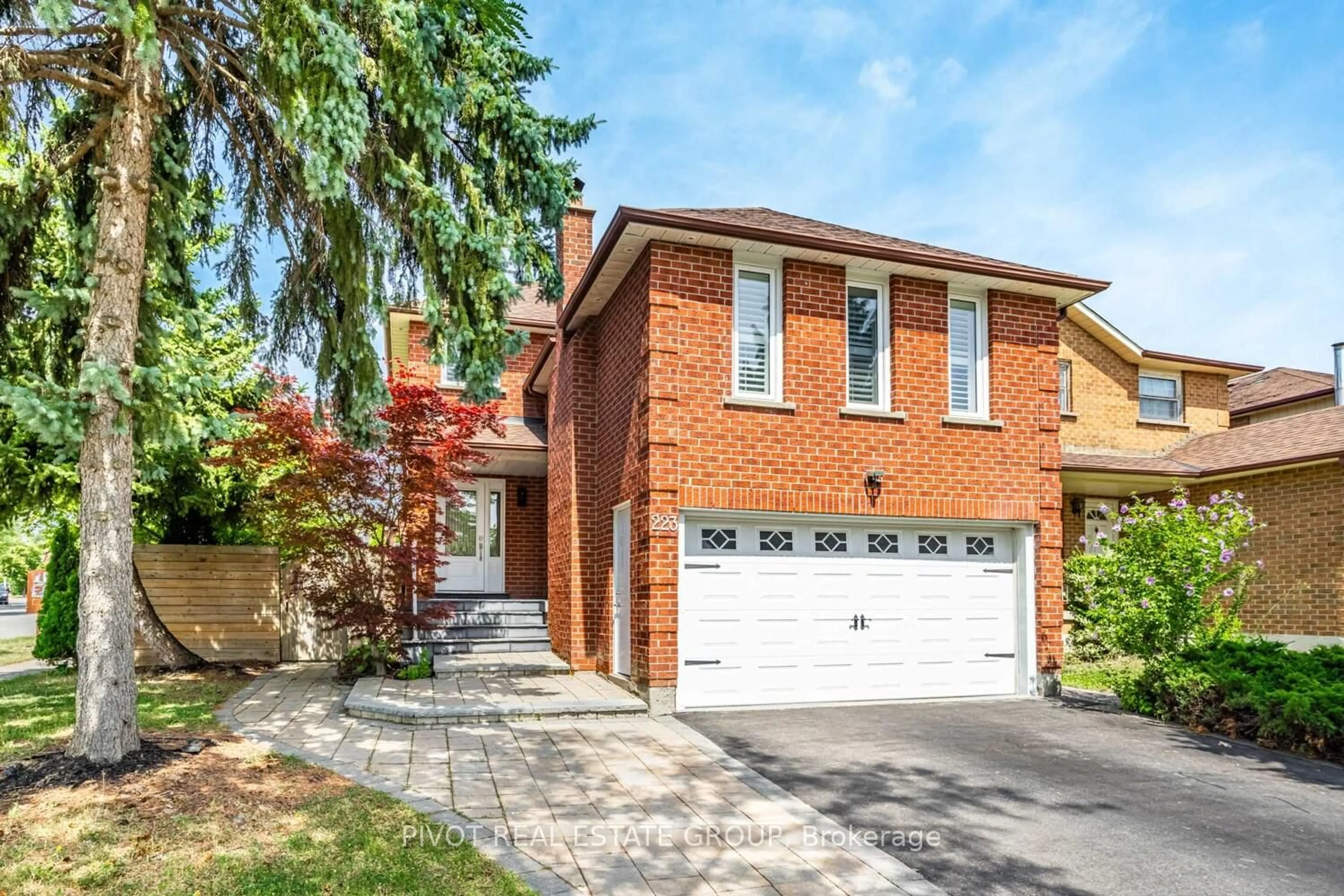 Home with brick exterior material, street for 223 Lech Walesa Dr, Mississauga Ontario L5B 3H7