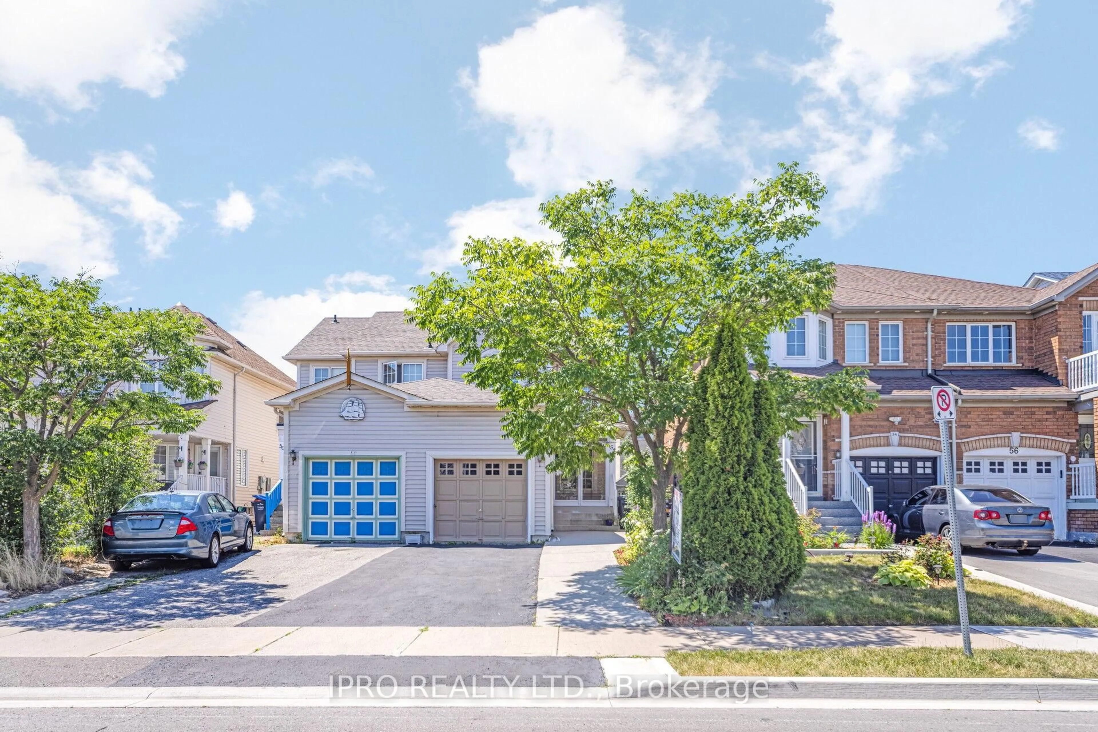 A pic from outside/outdoor area/front of a property/back of a property/a pic from drone, street for 52 Tiller Tr, Brampton Ontario L6X 4S6