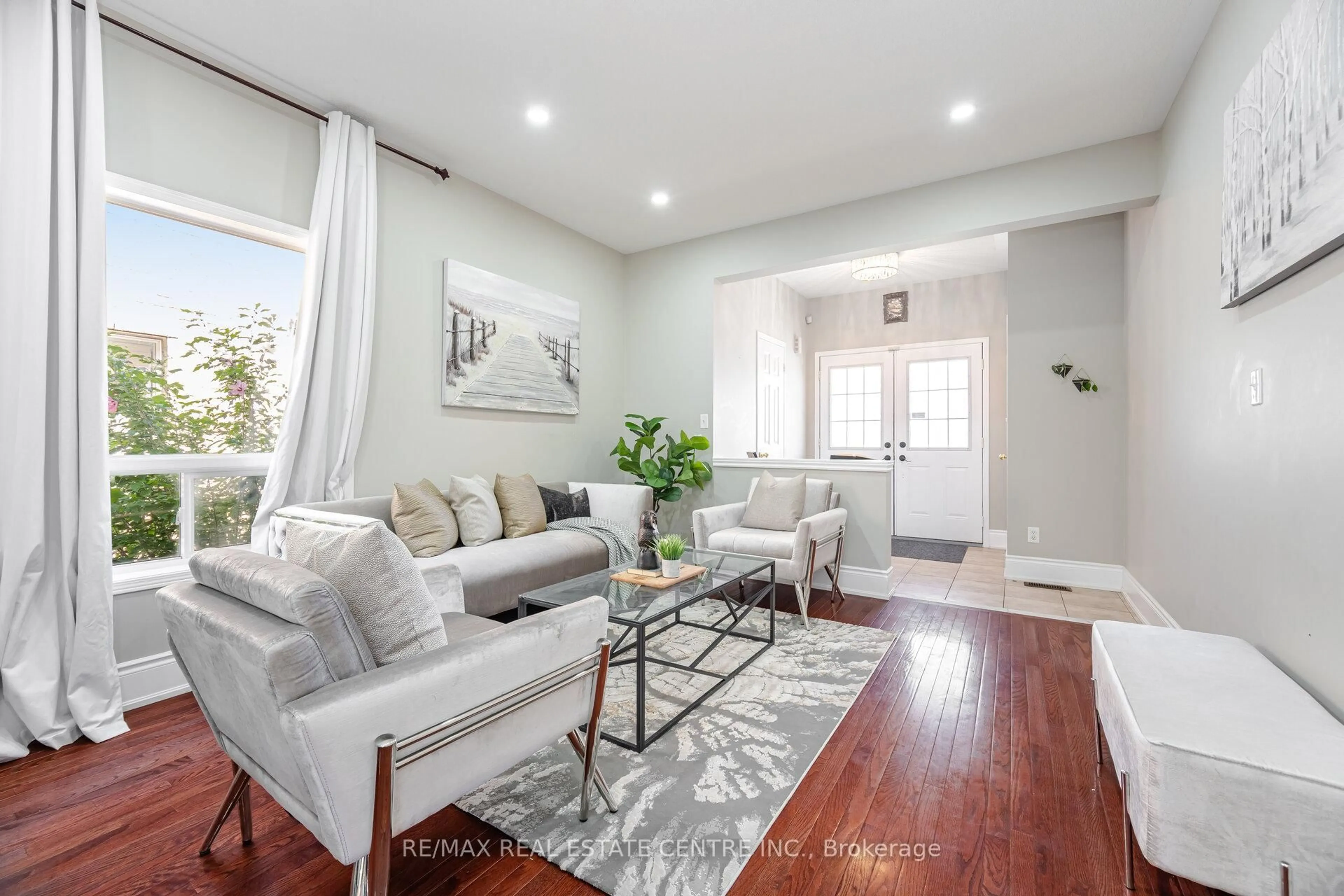 Living room with furniture, unknown for 20 Stillman Dr, Brampton Ontario L6X 0T2