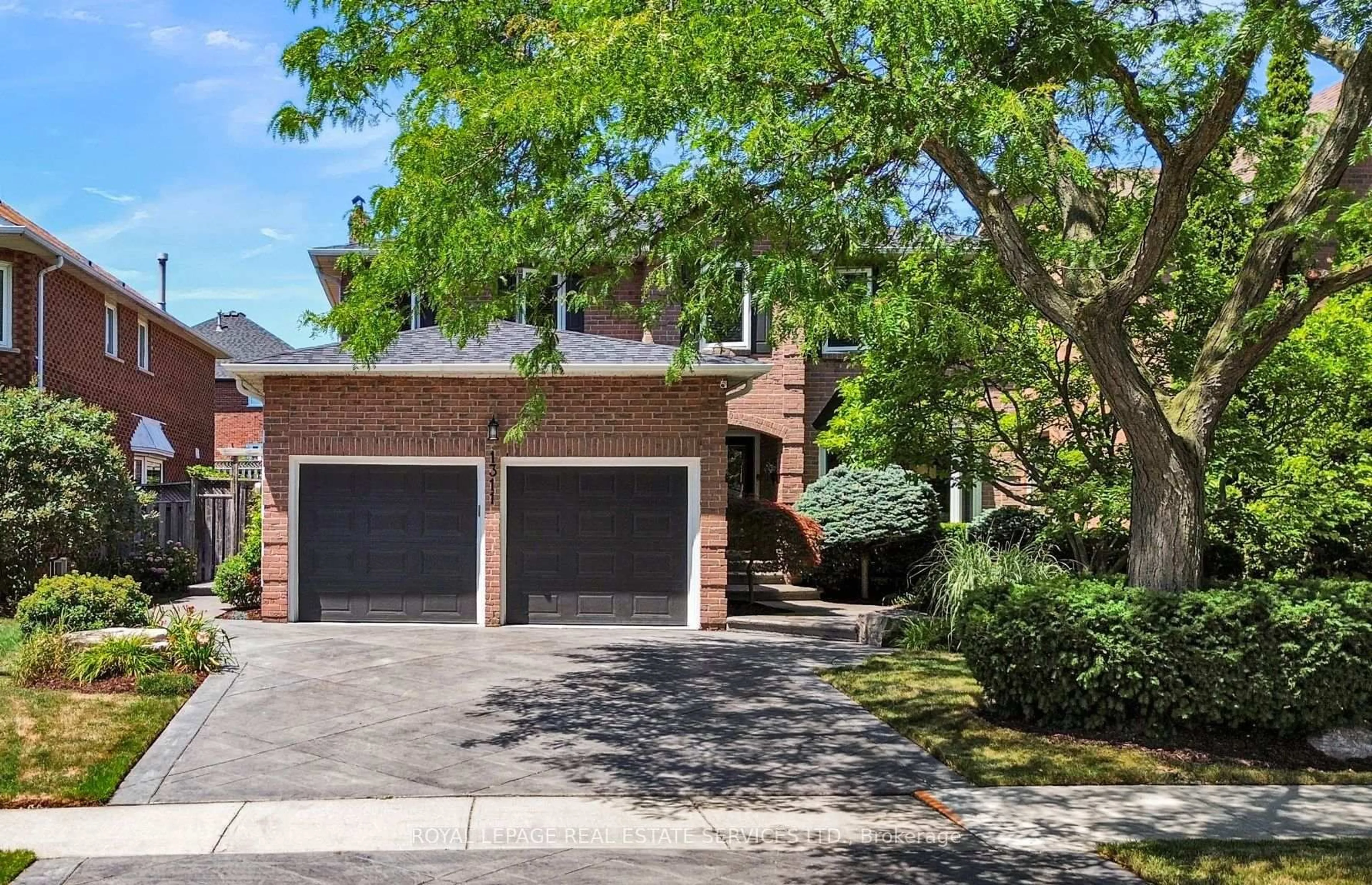 Home with brick exterior material, street for 1311 Fieldcrest Lane, Oakville Ontario L6M 2N6