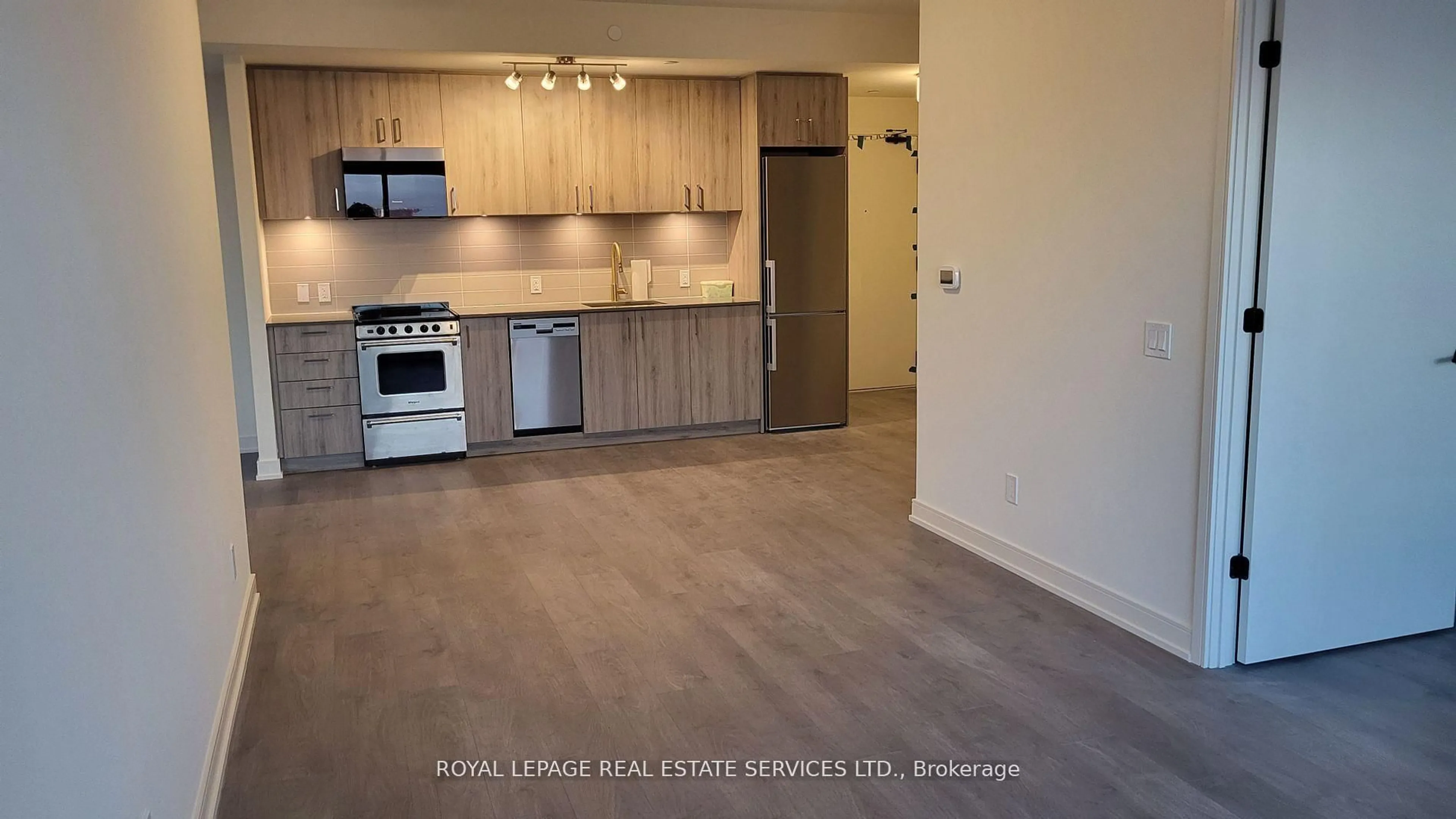 Open concept kitchen, wood/laminate floor for 8010 Derry Rd #1202, Milton Ontario L9T 9N3