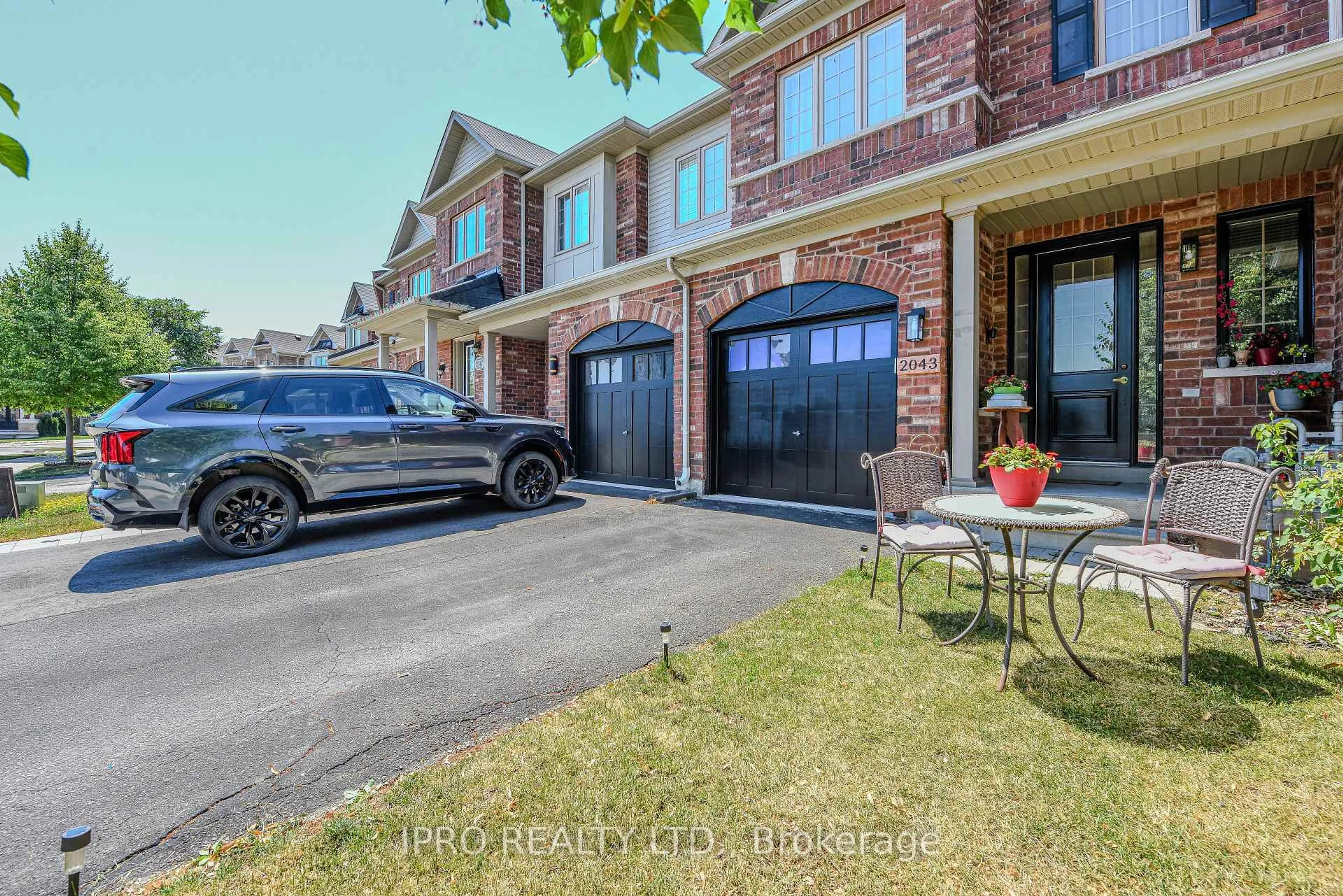 Home with brick exterior material, street for 2043 Fiddlers Way, Oakville Ontario L6M 0M4