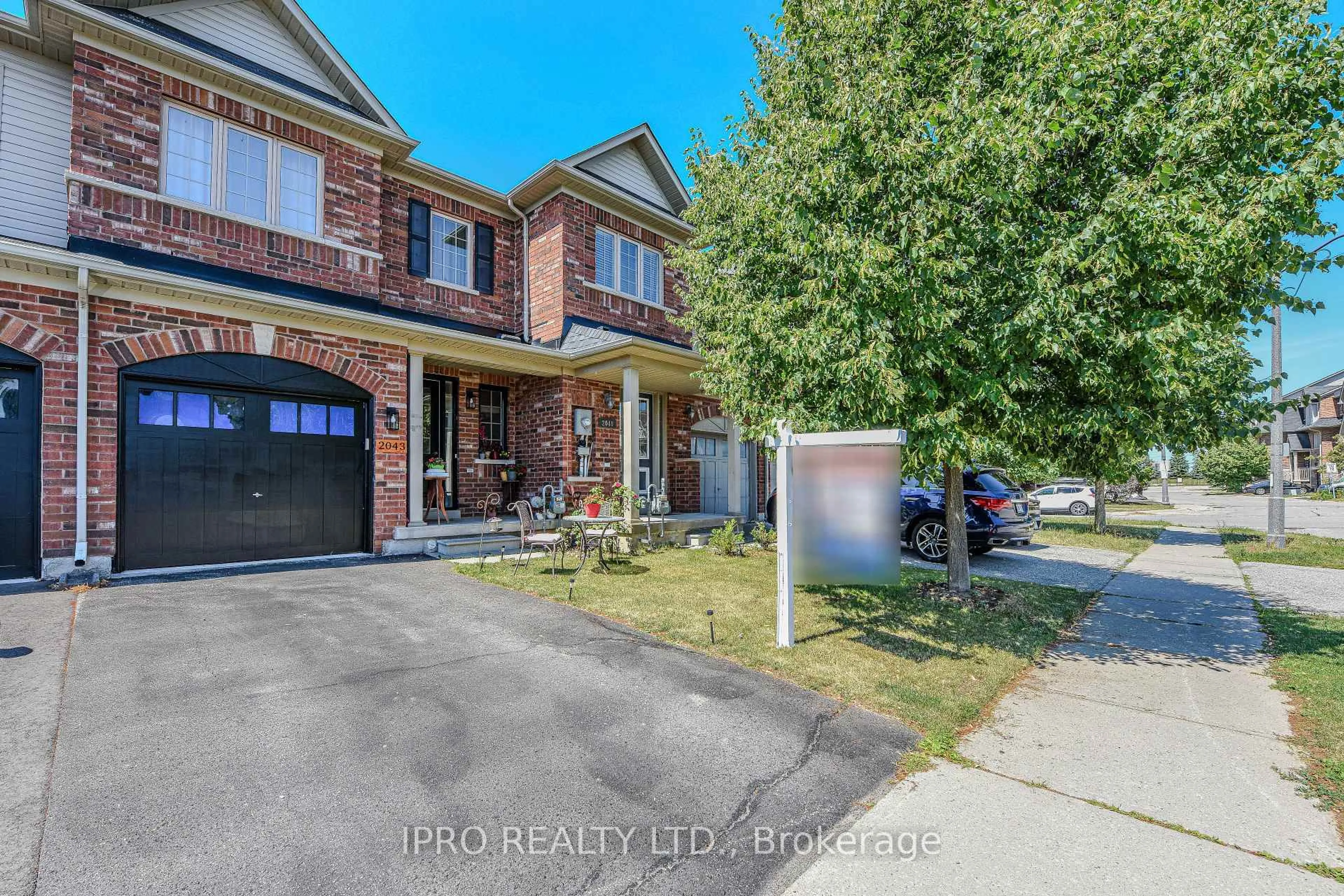 Home with brick exterior material, street for 2043 Fiddlers Way, Oakville Ontario L6M 0M4
