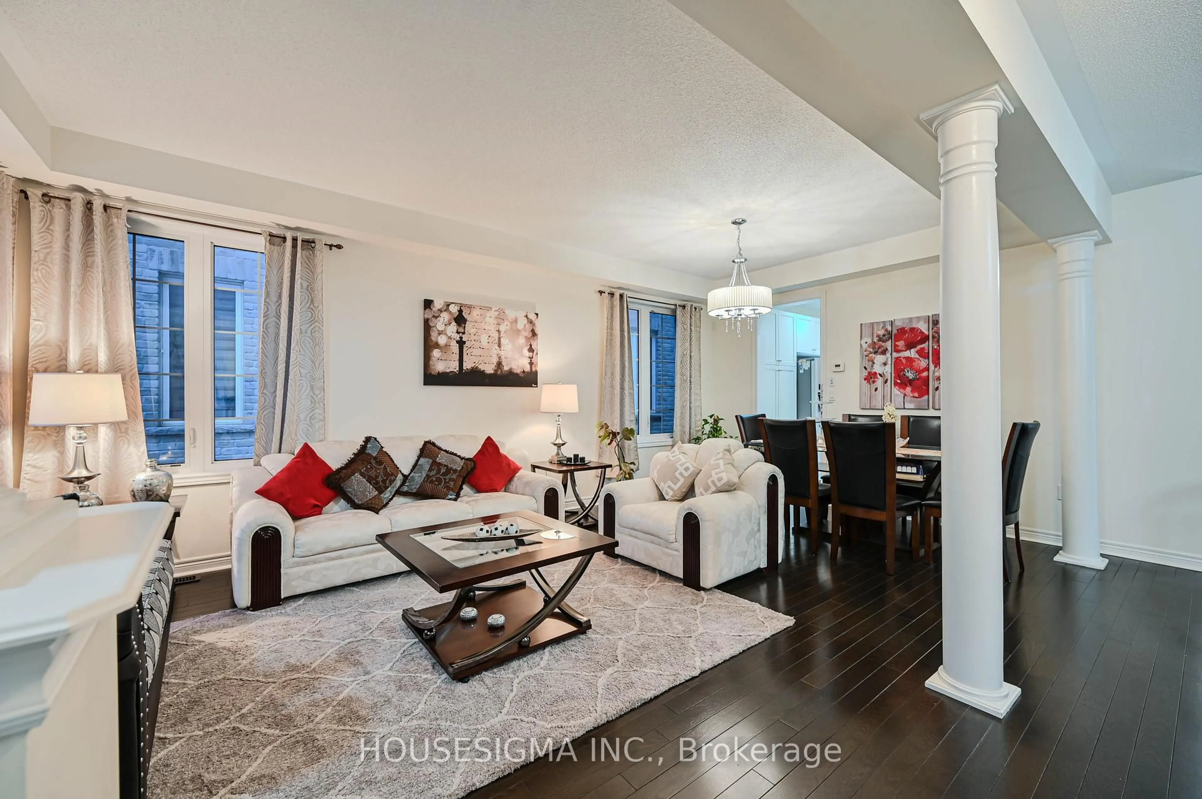 Living room with furniture, wood/laminate floor for 33 Bonnieglen Farm Blvd, Caledon Ontario L7C 3X8