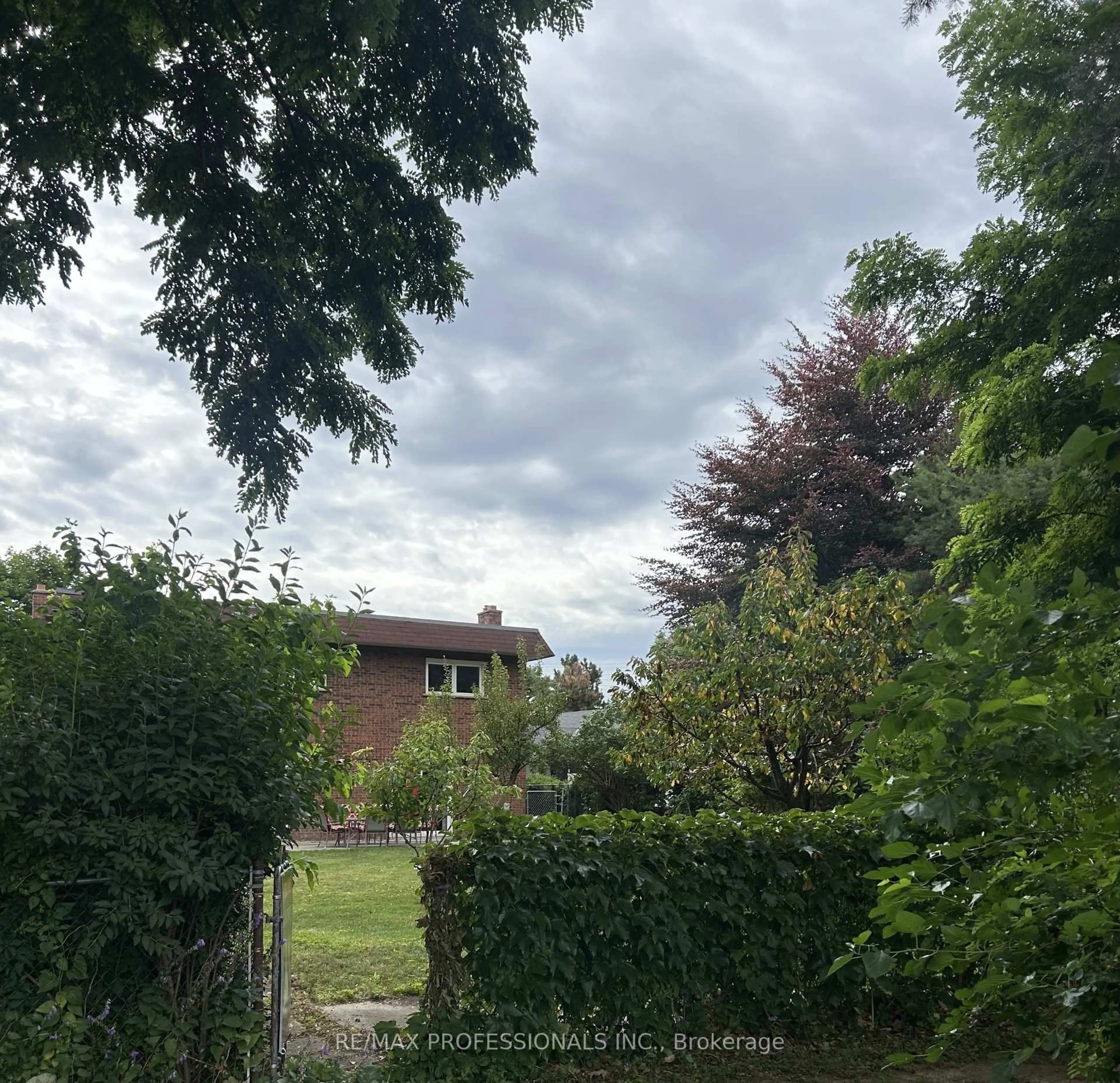 A pic from outside/outdoor area/front of a property/back of a property/a pic from drone, forest/trees view for 8 St Phillips Rd, Toronto Ontario M9P 2N6