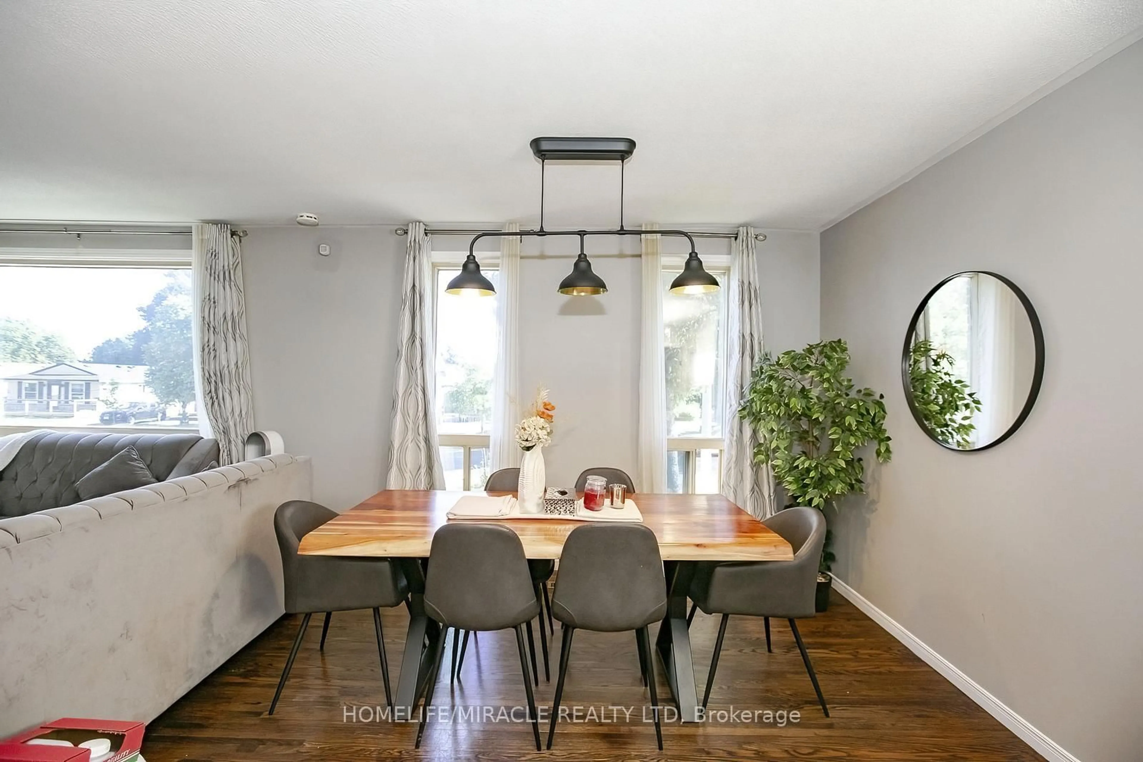 Dining room, wood/laminate floor for 46 Reigate Ave, Brampton Ontario L6V 2E3