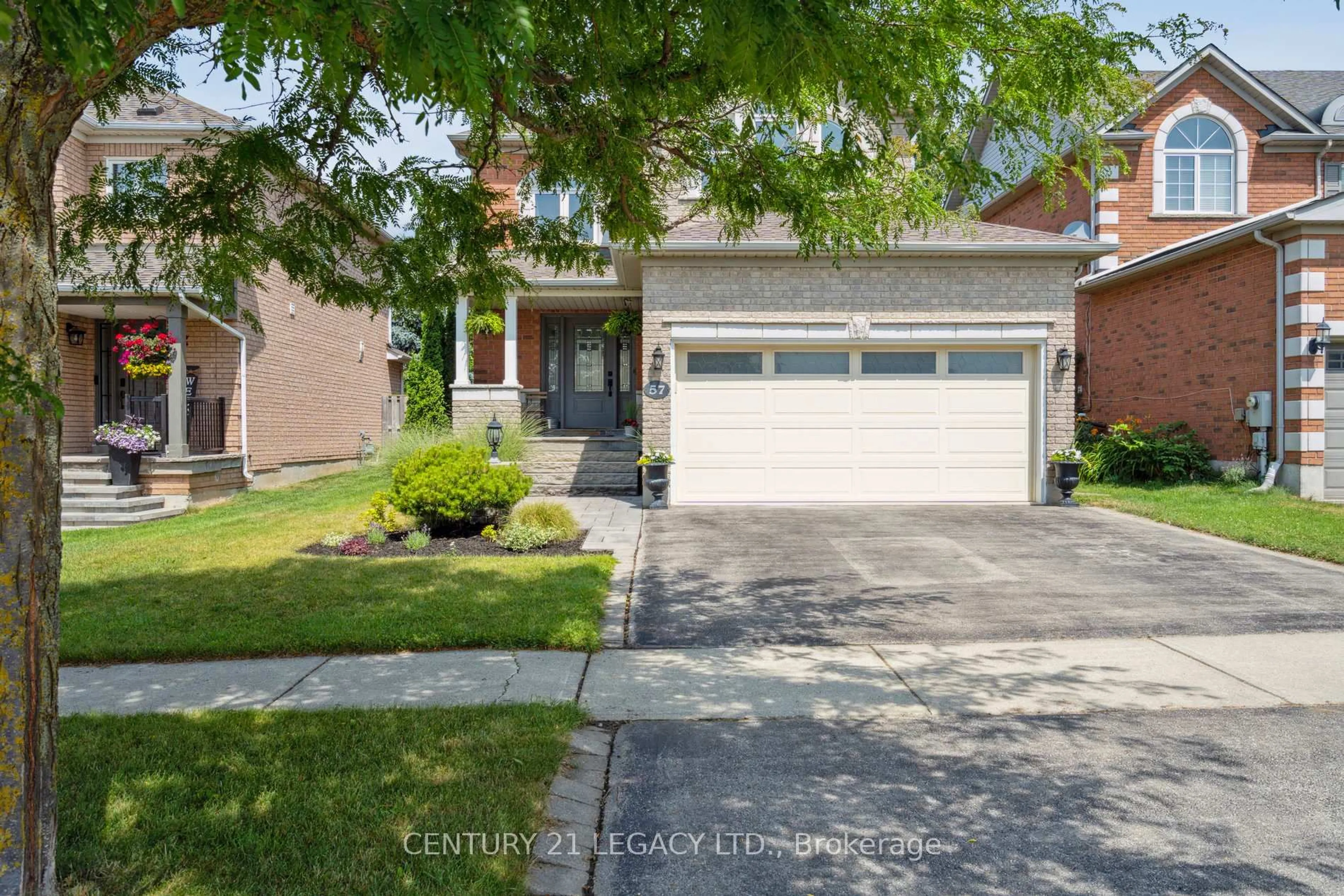 Home with brick exterior material, street for 57 Berton Blvd, Halton Hills Ontario L7G 6C7