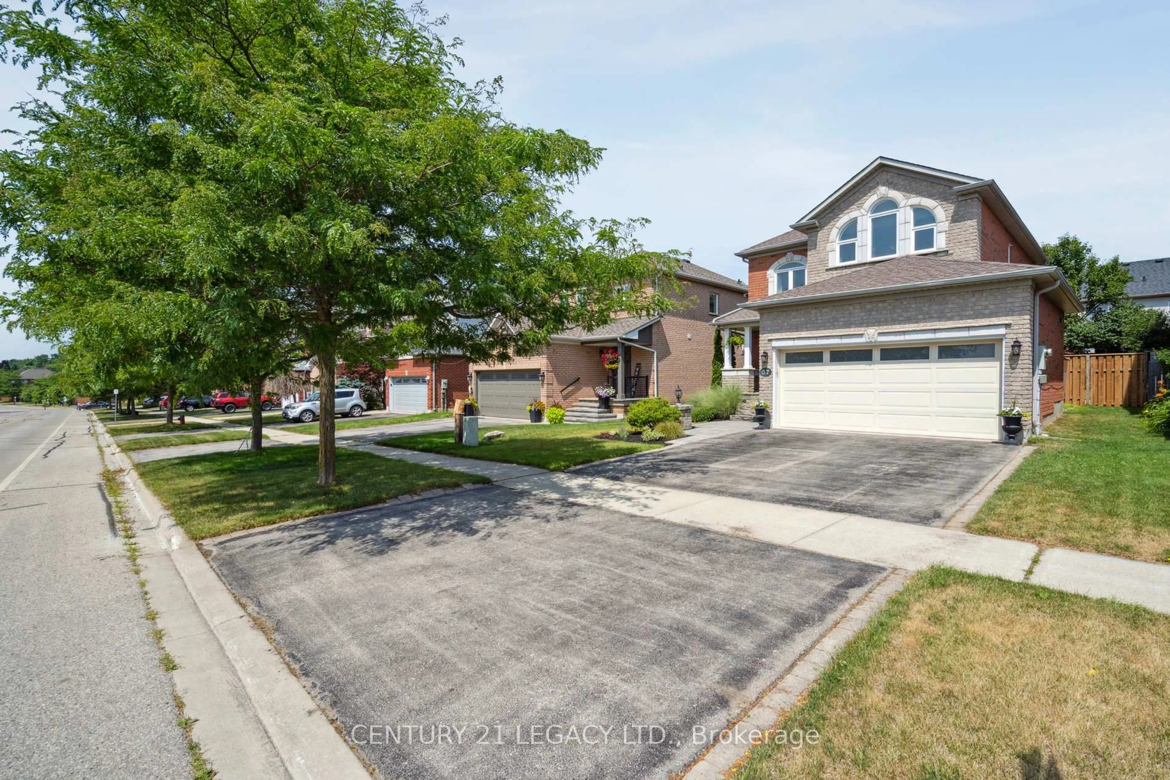 A pic from outside/outdoor area/front of a property/back of a property/a pic from drone, street for 57 Berton Blvd, Halton Hills Ontario L7G 6C7