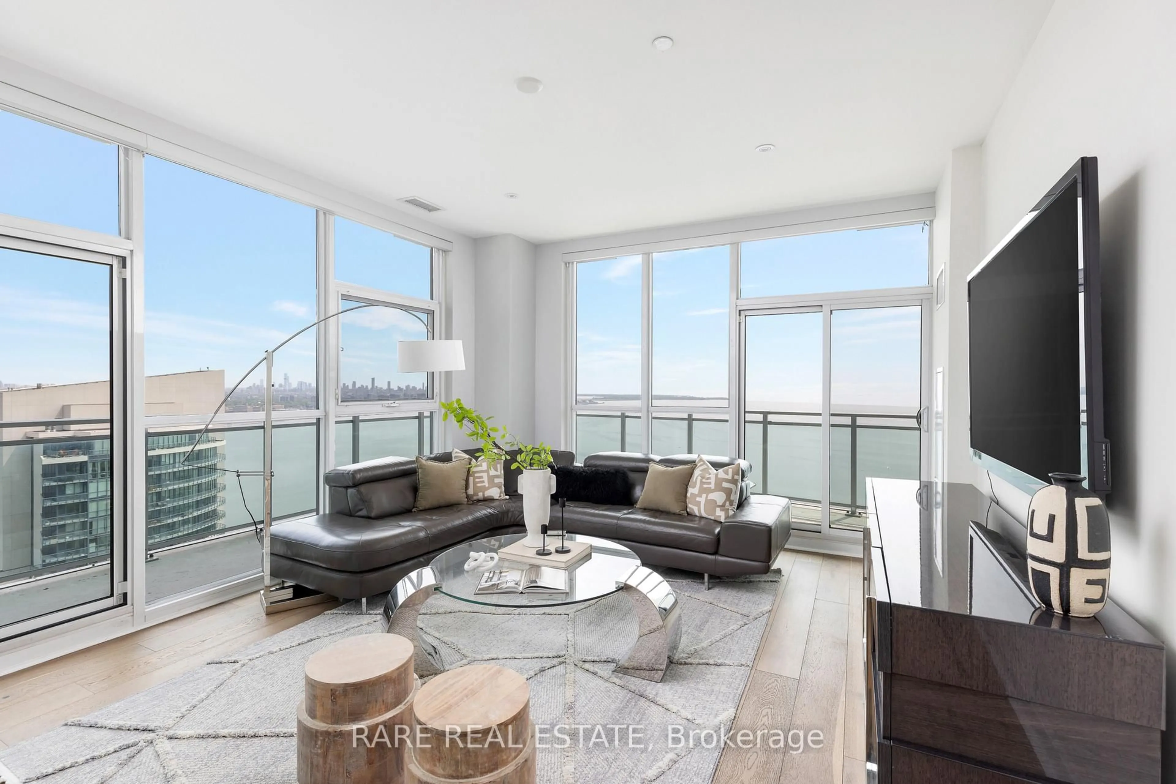 Living room with furniture, unknown for 33 Shore Breeze Dr #UPH4103, Toronto Ontario M8V 0G1