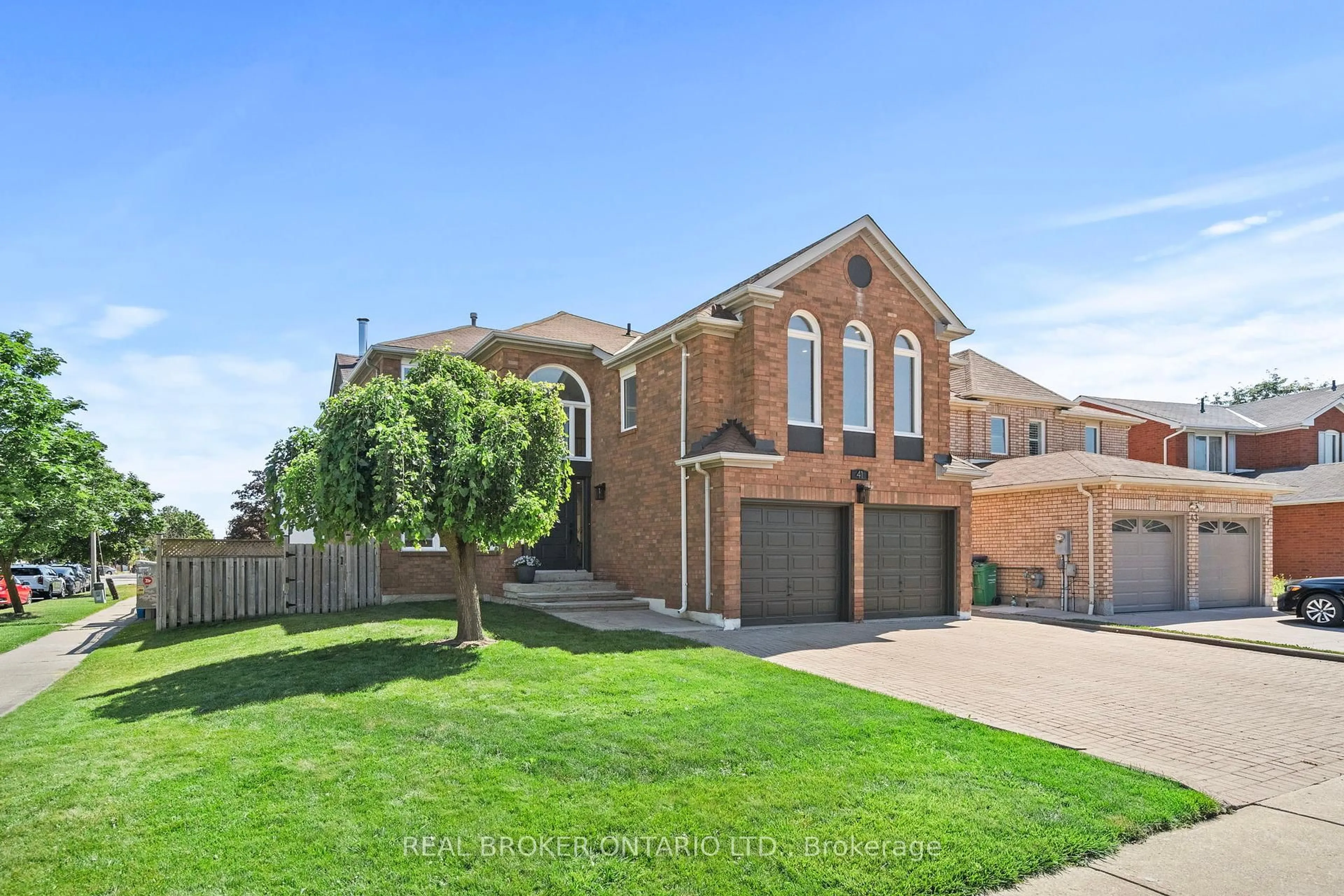 Home with brick exterior material, street for 41 Duggan Dr, Brampton Ontario L6Y 4J2
