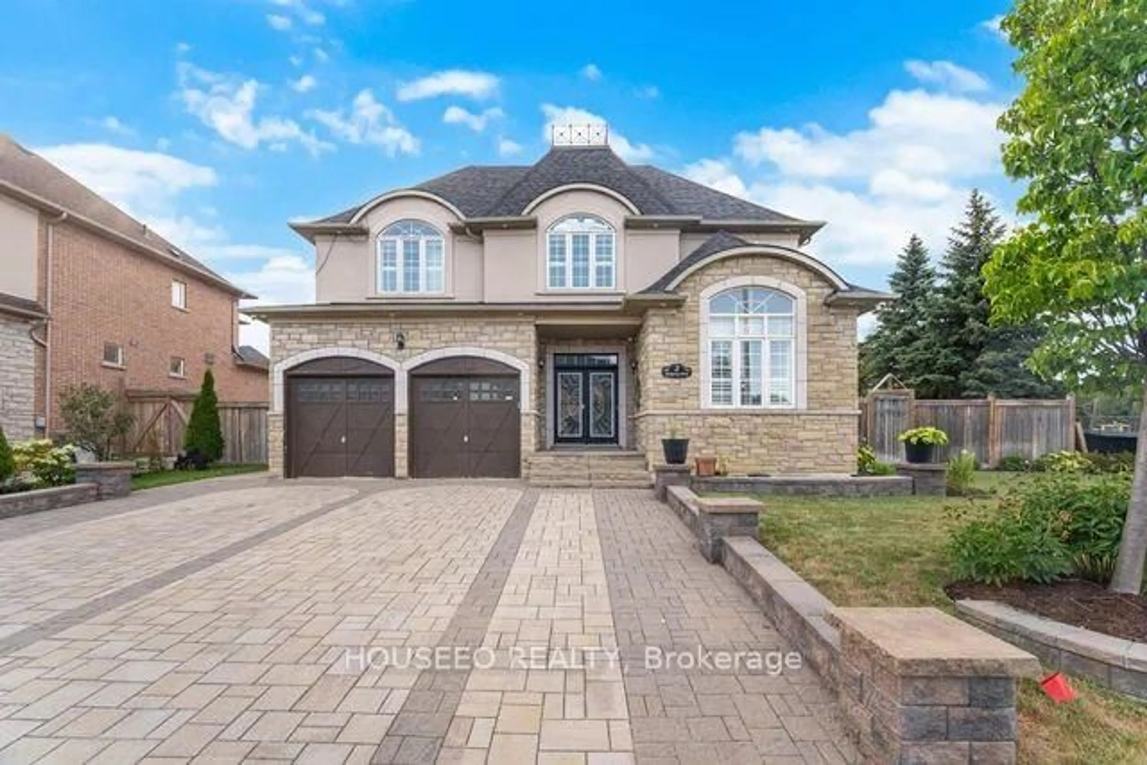 Home with brick exterior material, street for 2 Richgrove Dr, Brampton Ontario L6P 1X1