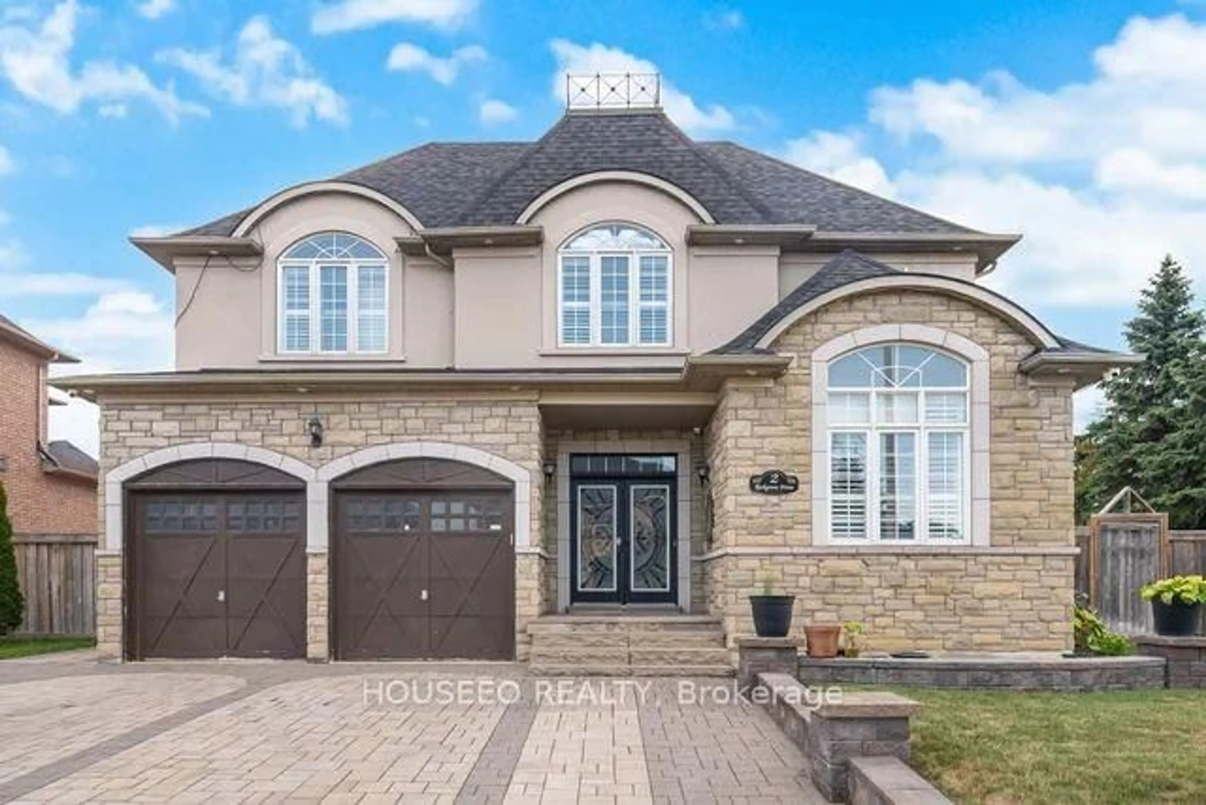 Home with brick exterior material, street for 2 Richgrove Dr, Brampton Ontario L6P 1X1