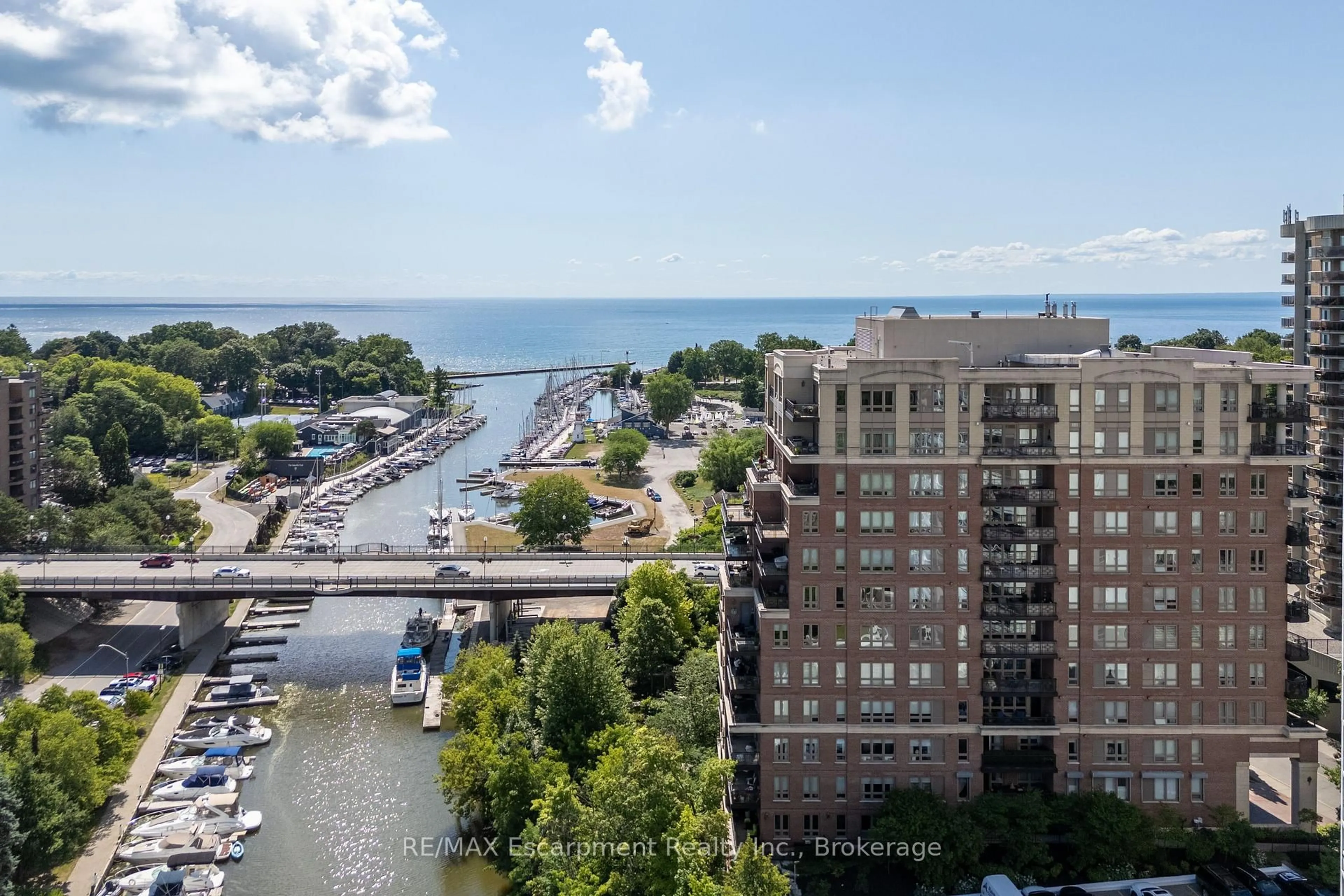 A pic from outside/outdoor area/front of a property/back of a property/a pic from drone, water/lake/river/ocean view for 111 Forsythe St #807, Oakville Ontario L6K 3J9