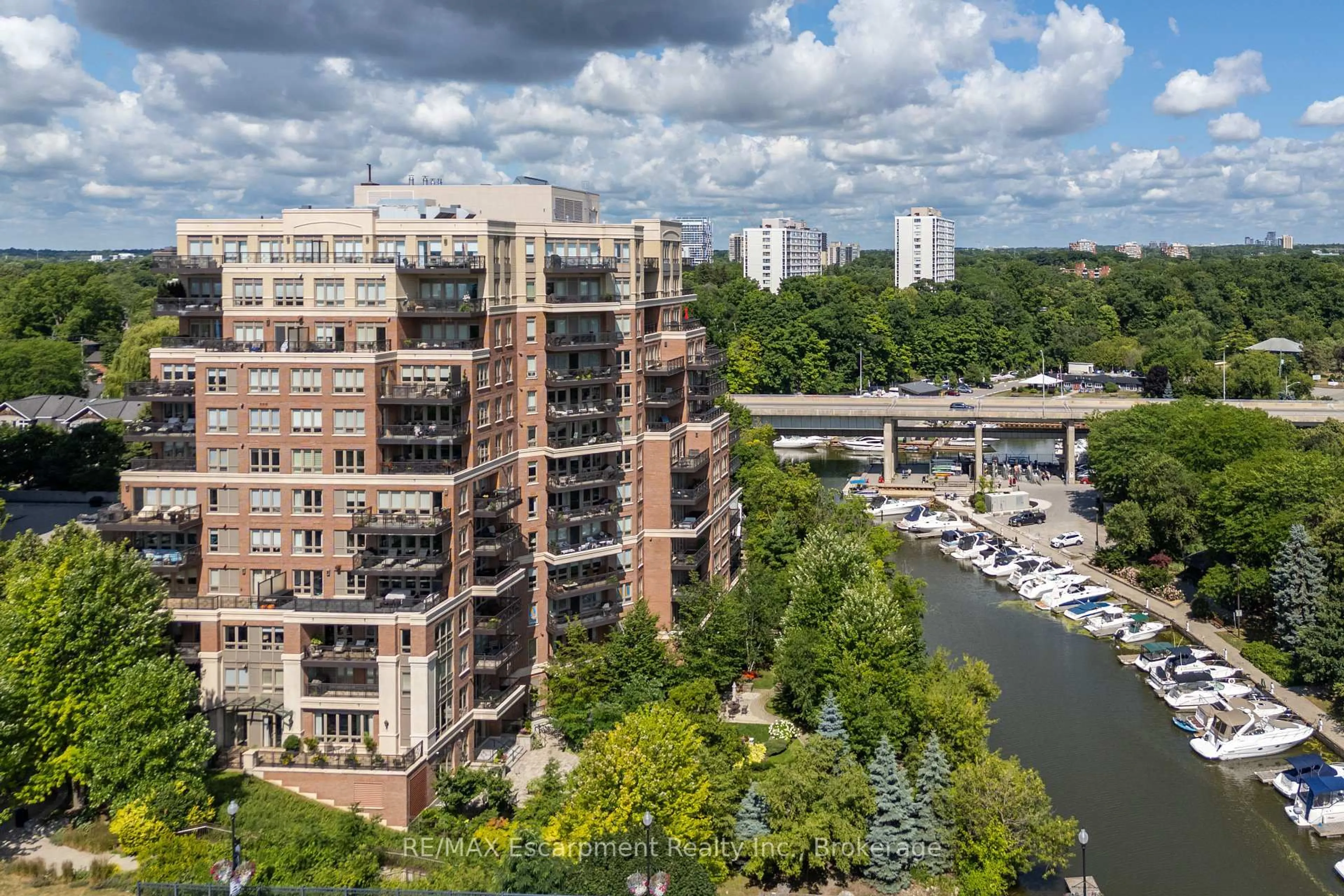 A pic from outside/outdoor area/front of a property/back of a property/a pic from drone, city buildings view from balcony for 111 Forsythe St #807, Oakville Ontario L6K 3J9