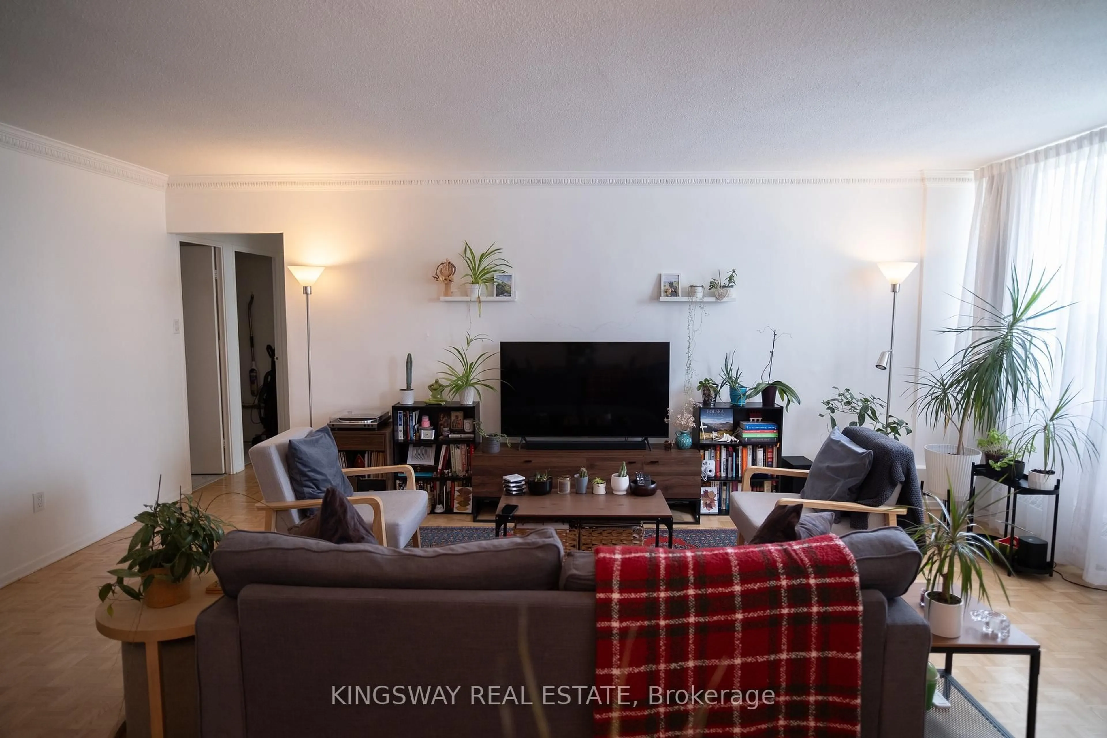 Living room with furniture, wood/laminate floor for 451 The West Mall Dr #518, Toronto Ontario M9C 1G1