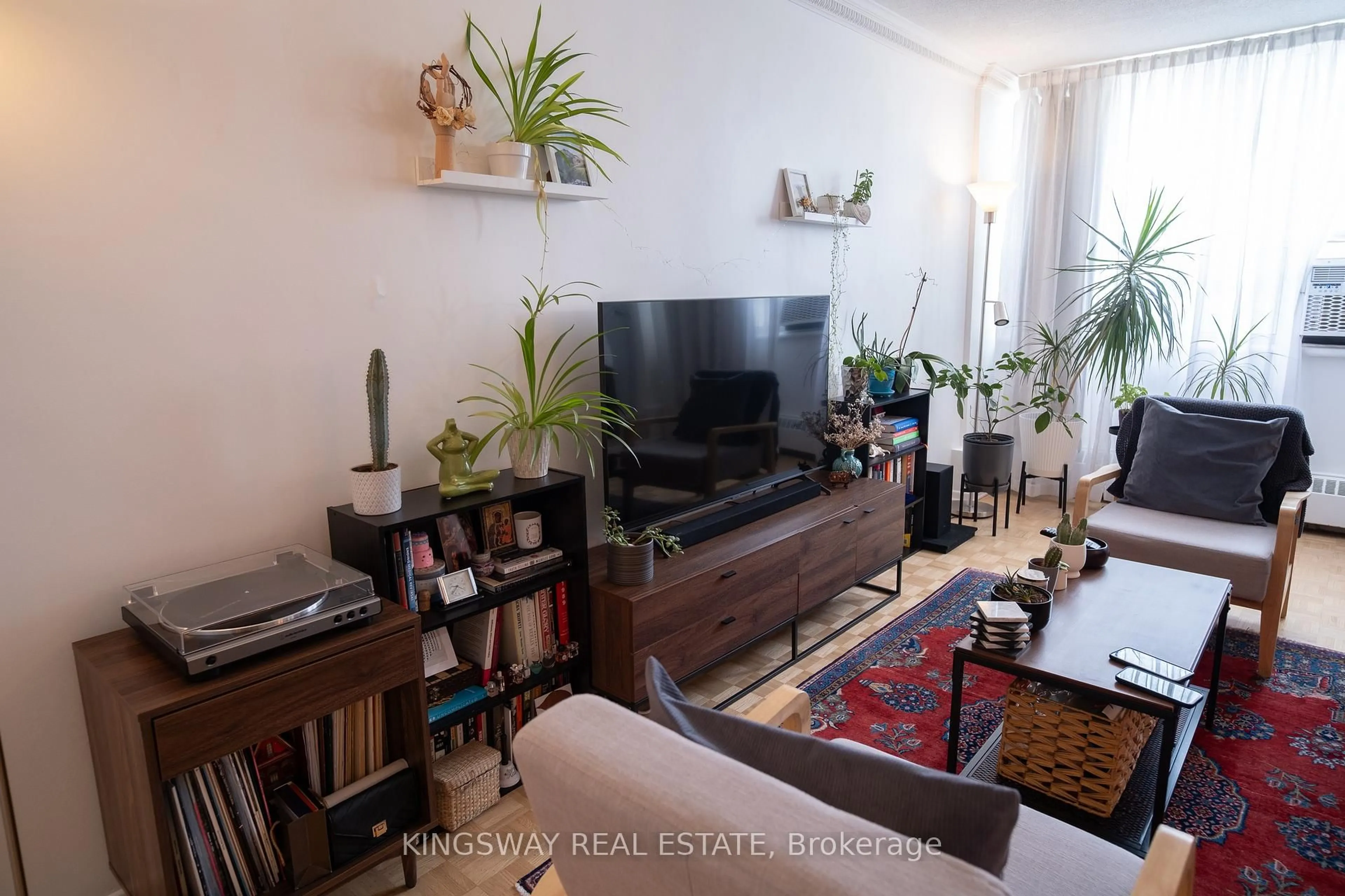 Living room with furniture, wood/laminate floor for 451 The West Mall Dr #518, Toronto Ontario M9C 1G1
