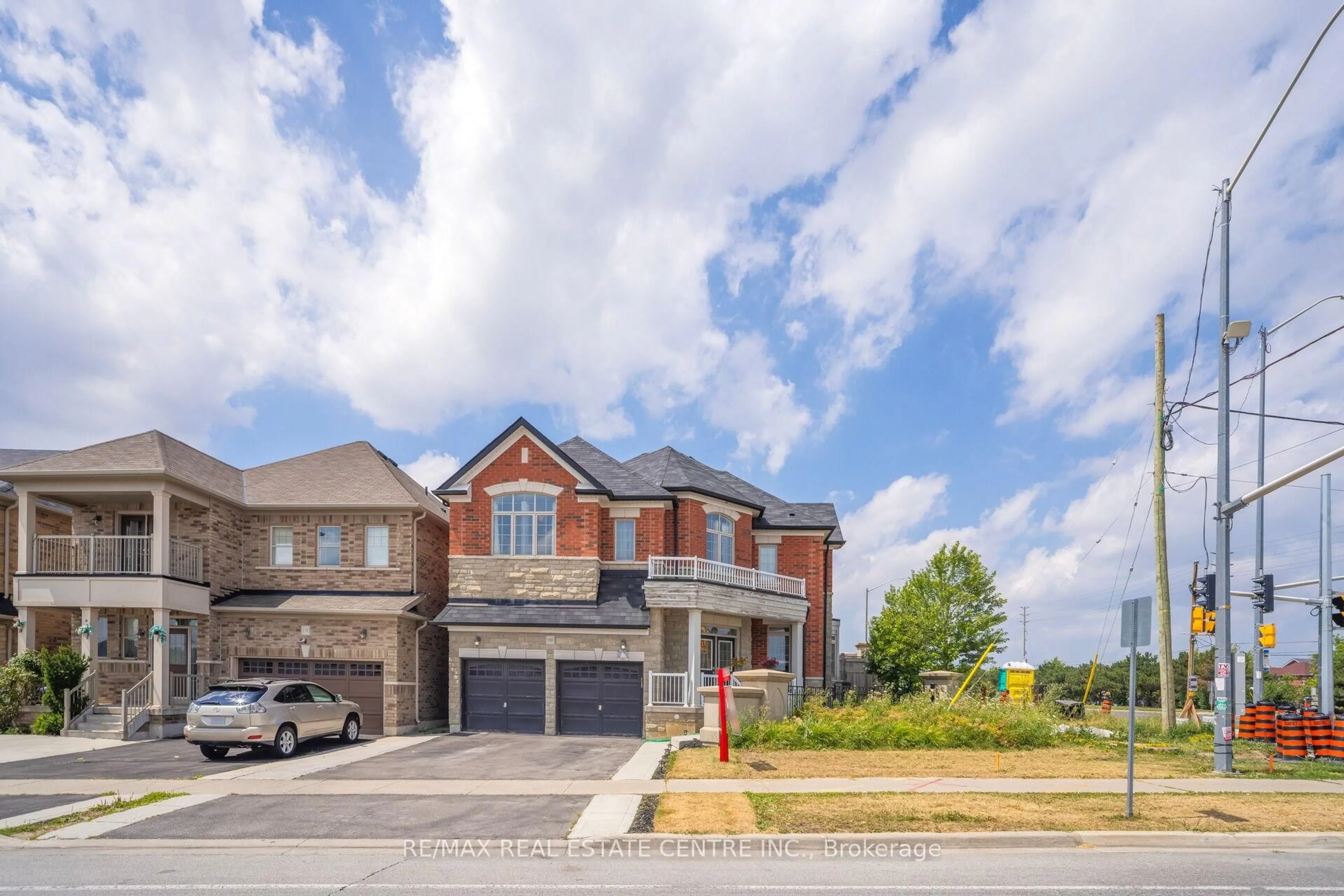 Home with brick exterior material, street for 180 Bonnie Braes Dr, Brampton Ontario L6Y 5Y7
