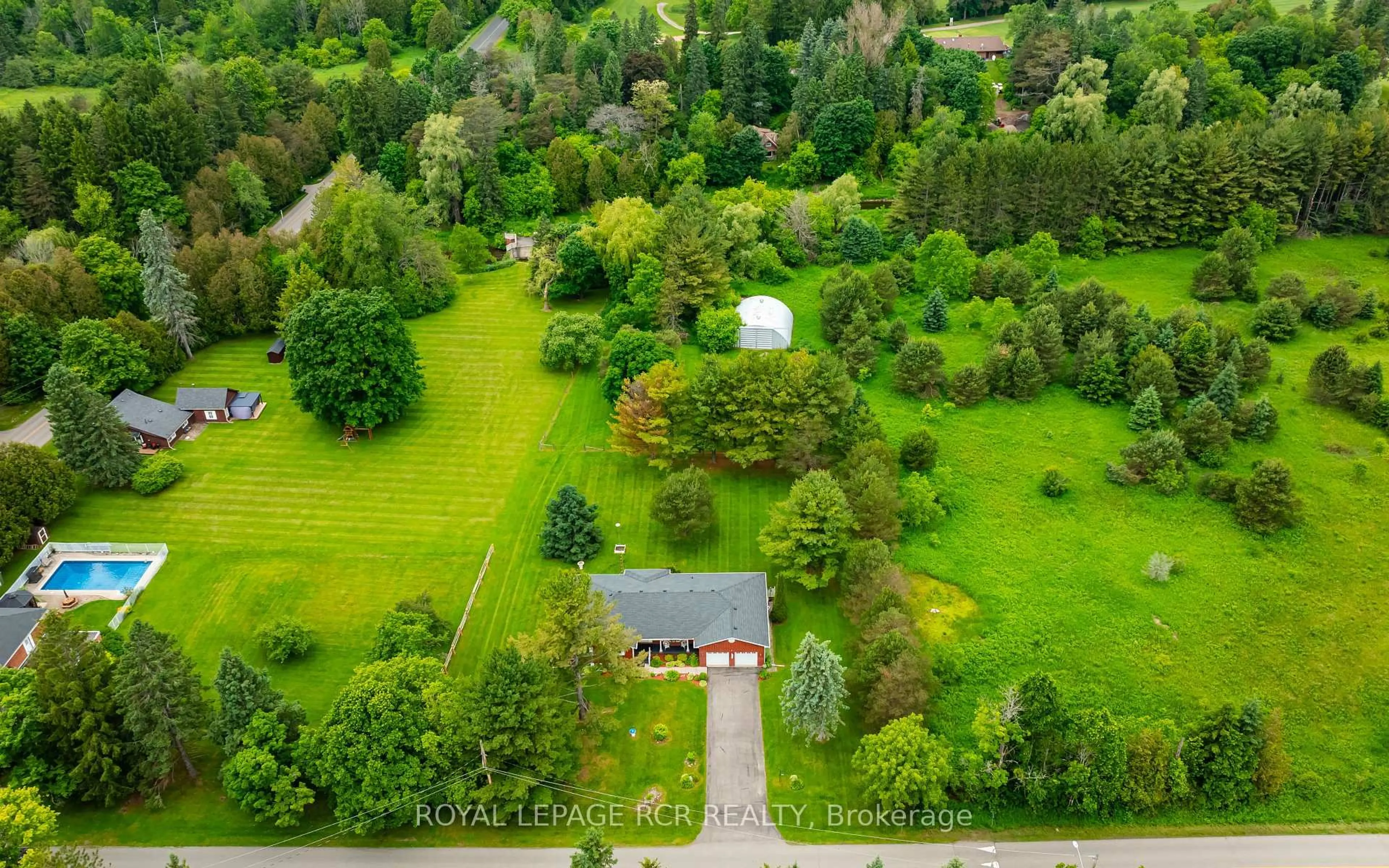 A pic from outside/outdoor area/front of a property/back of a property/a pic from drone, forest/trees view for 2534 Highpoint Sdrd, Caledon Ontario L7K 0J1