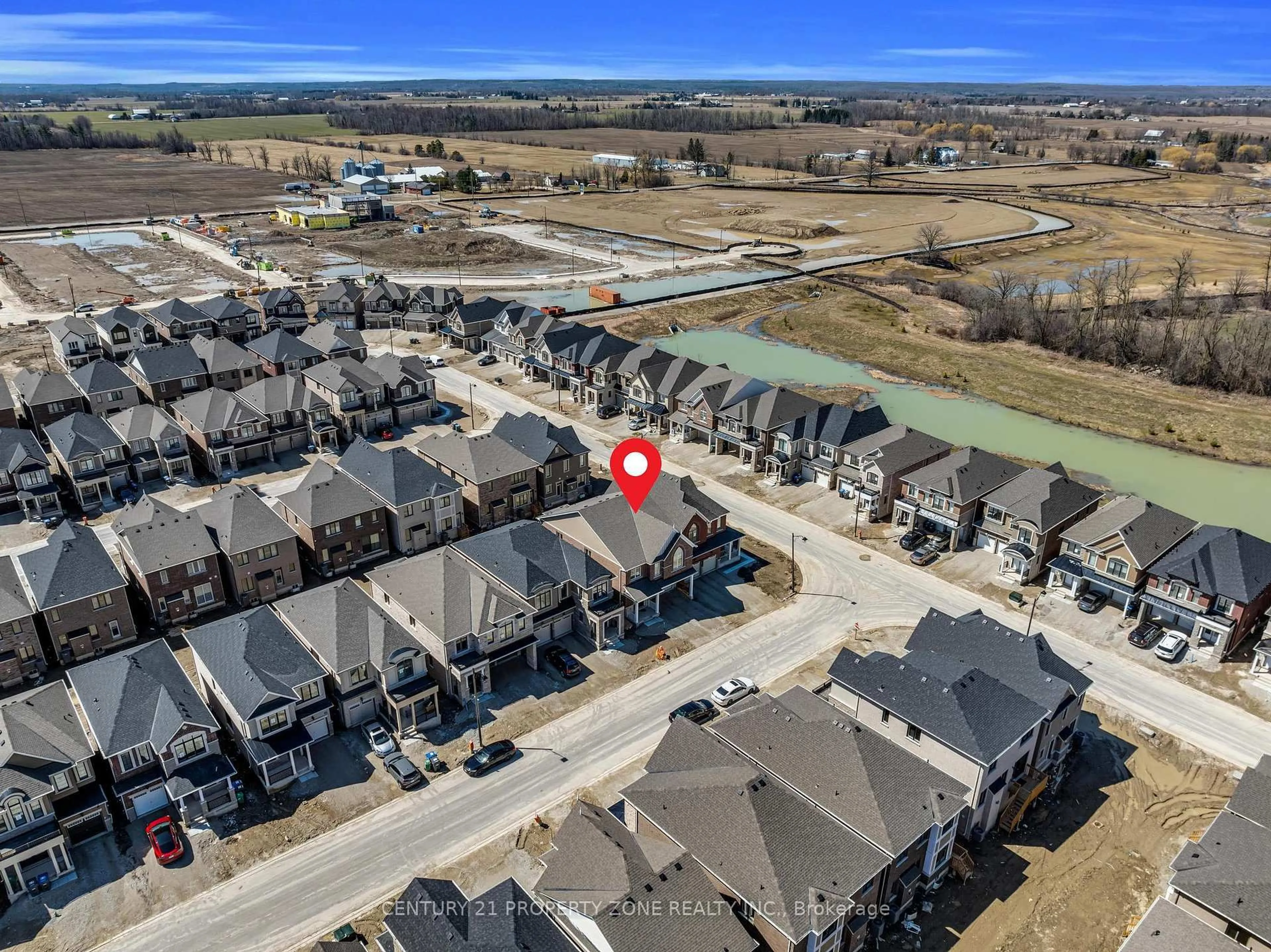 A pic from outside/outdoor area/front of a property/back of a property/a pic from drone, water/lake/river/ocean view for 18 Cloudberry St, Caledon Ontario L7C 4N8