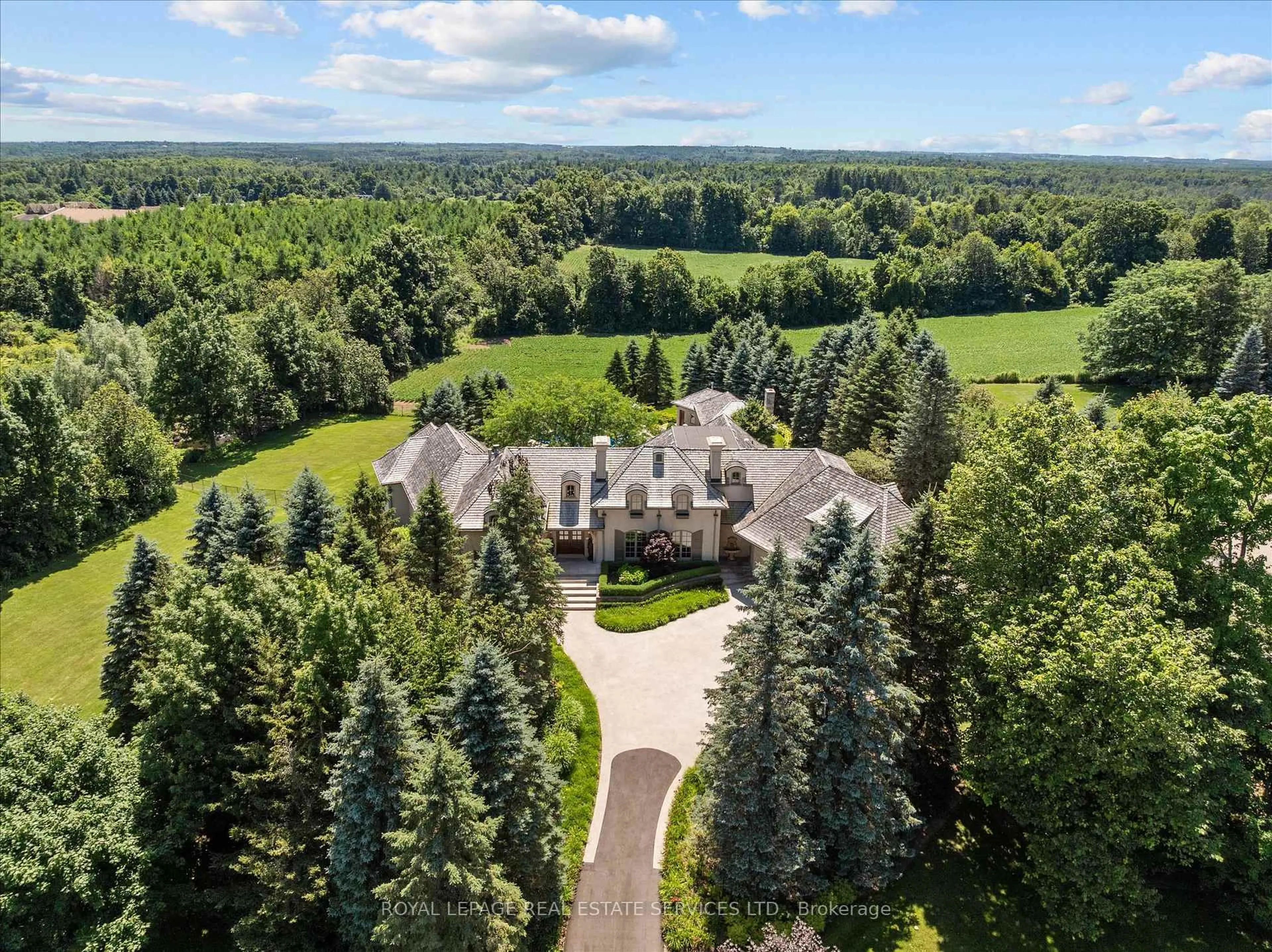A pic from outside/outdoor area/front of a property/back of a property/a pic from drone, forest/trees view for 10090 Pineview Tr, Milton Ontario L0P 1B0