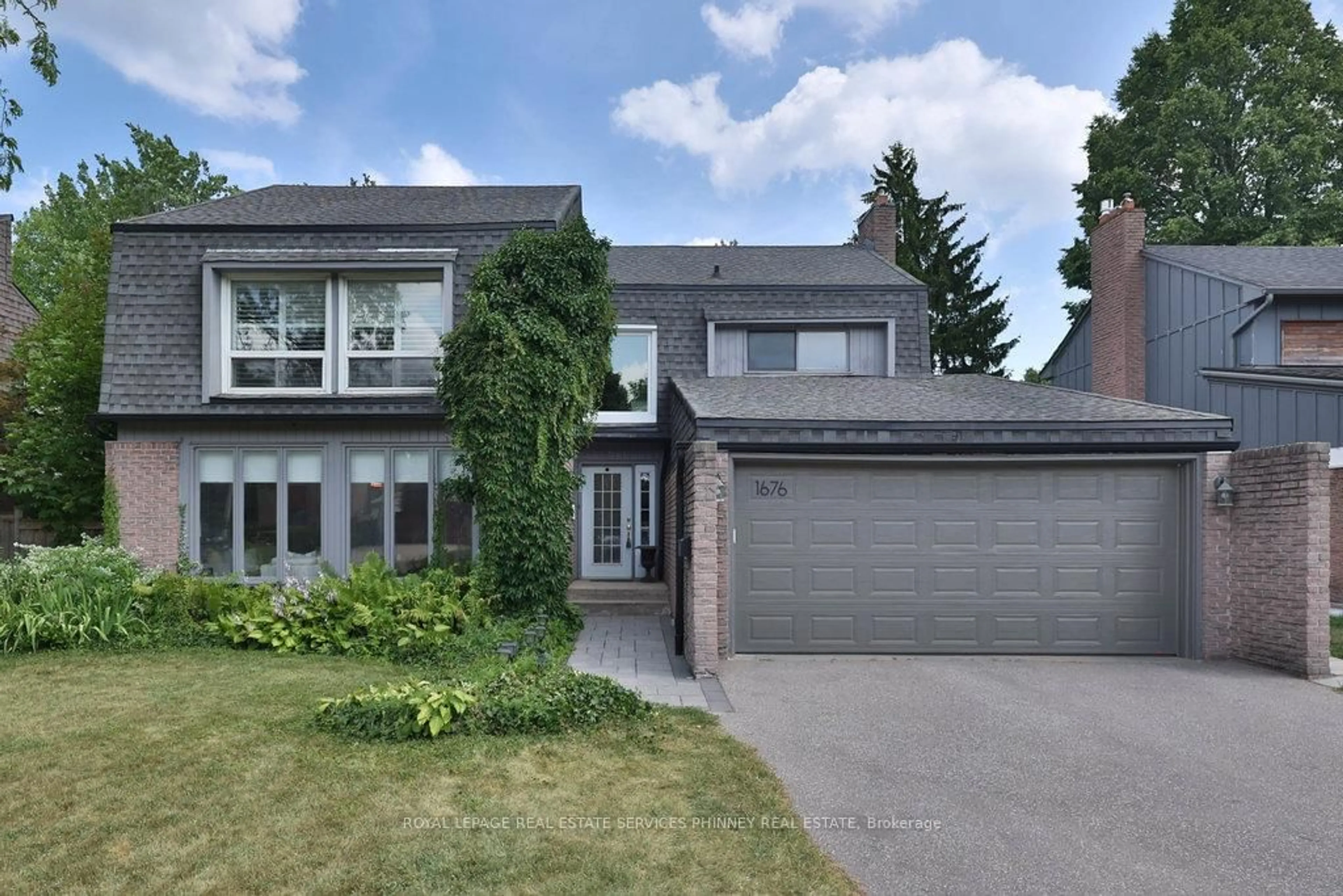 Home with brick exterior material, street for 1676 Wembury Rd, Mississauga Ontario L5J 4G3