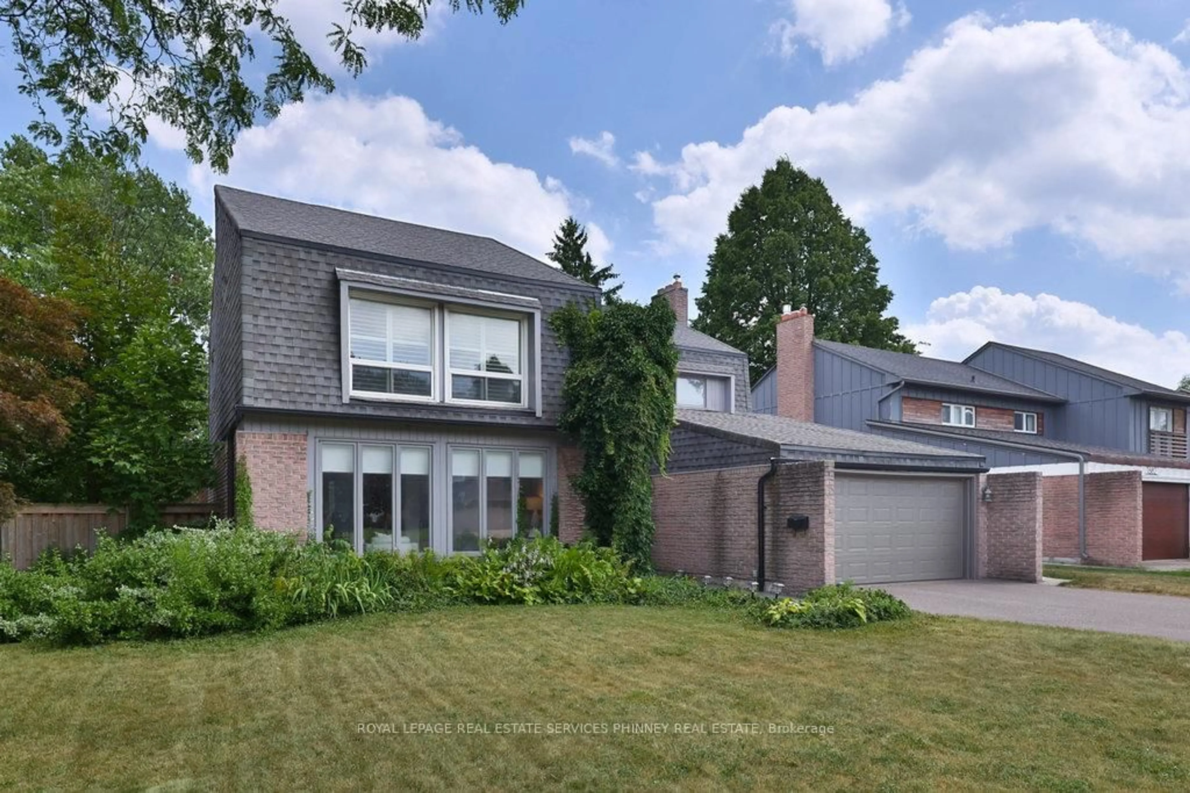 Home with brick exterior material, street for 1676 Wembury Rd, Mississauga Ontario L5J 4G3