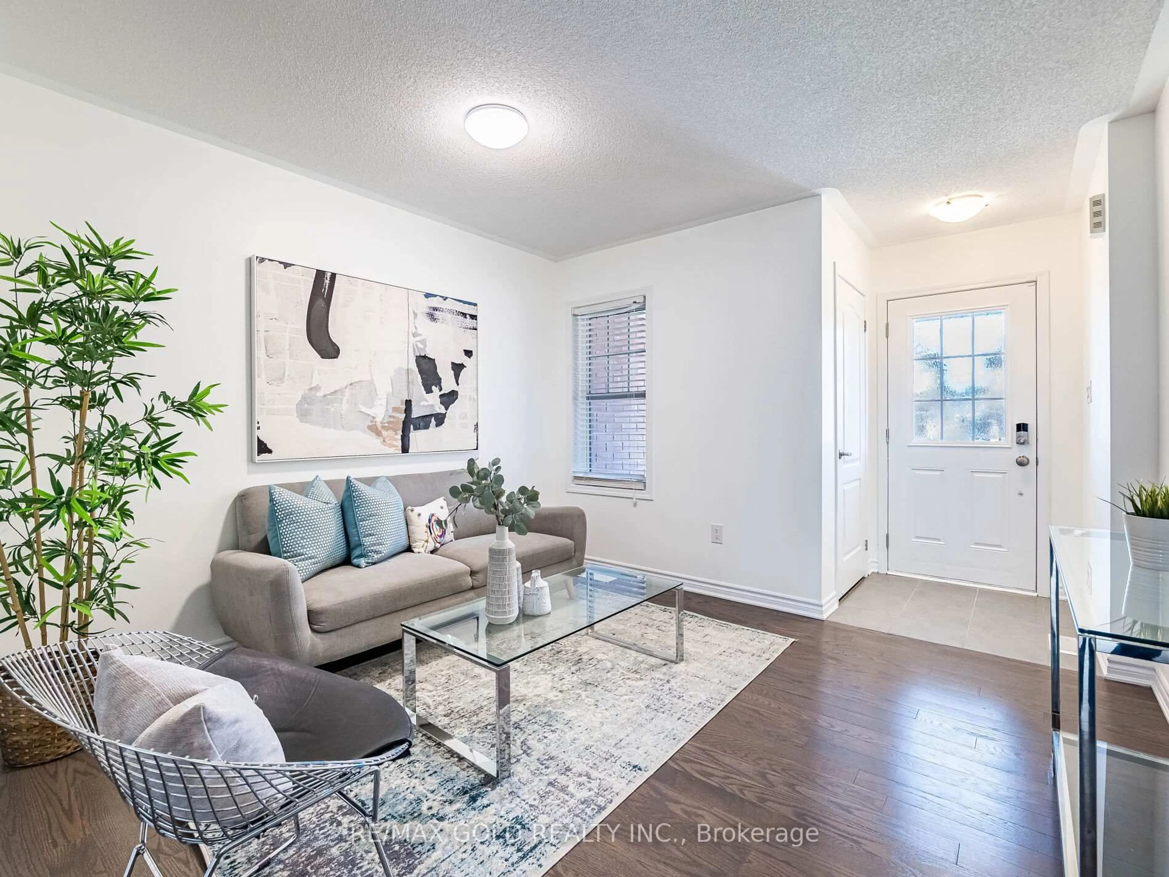 Living room with furniture, unknown for 104 Thornbush Blvd, Brampton Ontario L7A 4K1