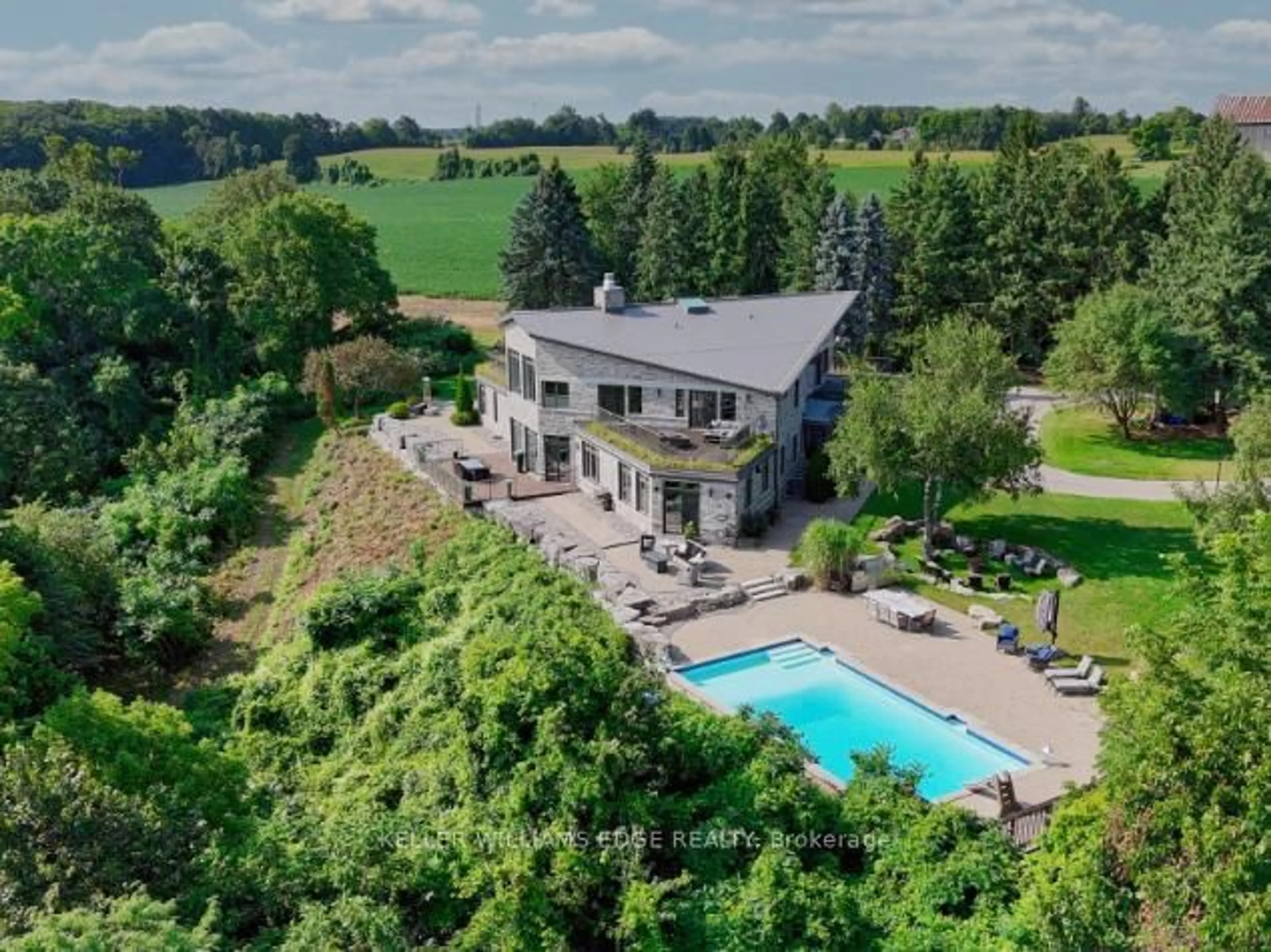 A pic from outside/outdoor area/front of a property/back of a property/a pic from drone, water/lake/river/ocean view for 5500 Steeles Ave, Milton Ontario L9T 2Y1