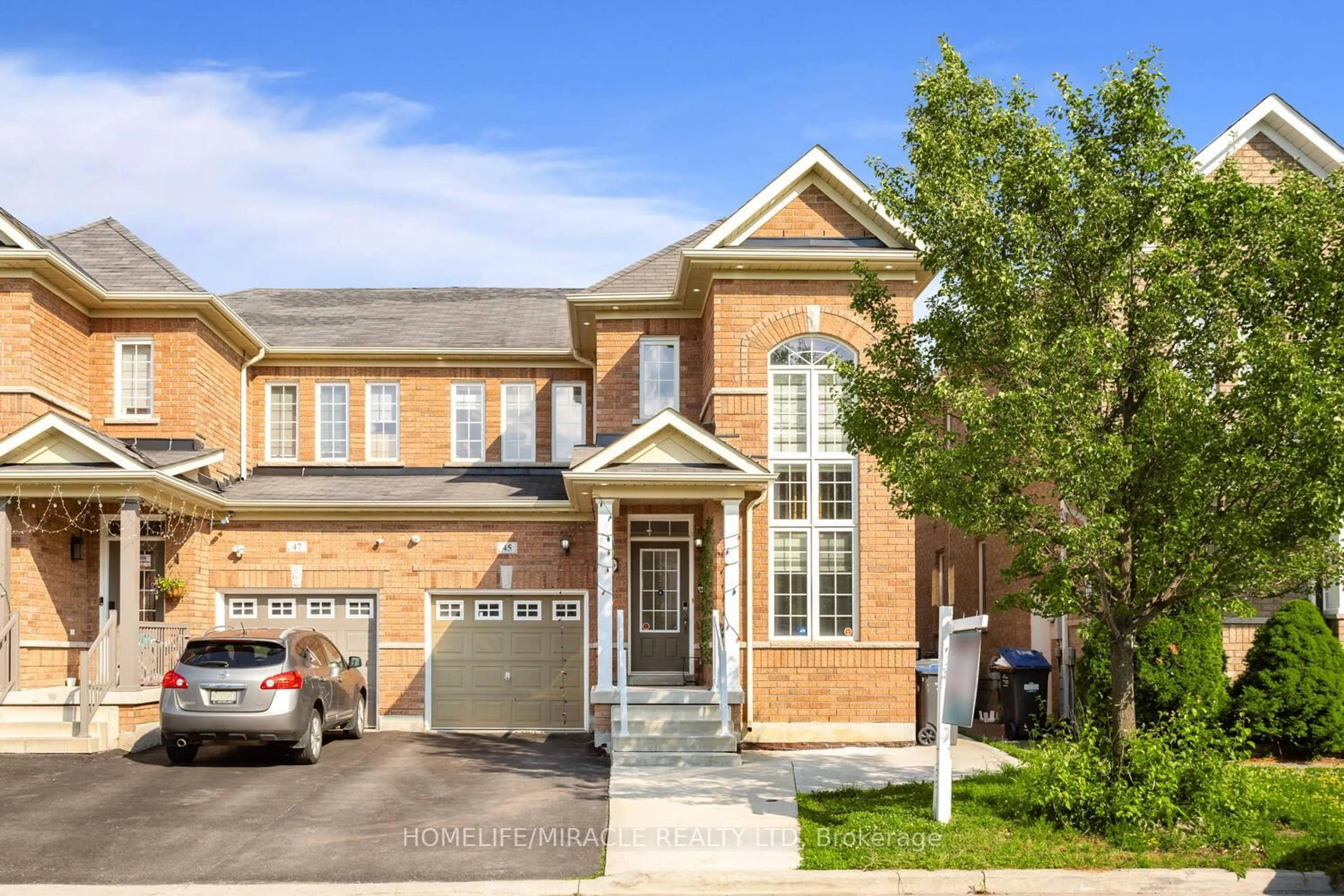 Home with brick exterior material, street for 45 Boundbrook Dr, Brampton Ontario L7A 0M1