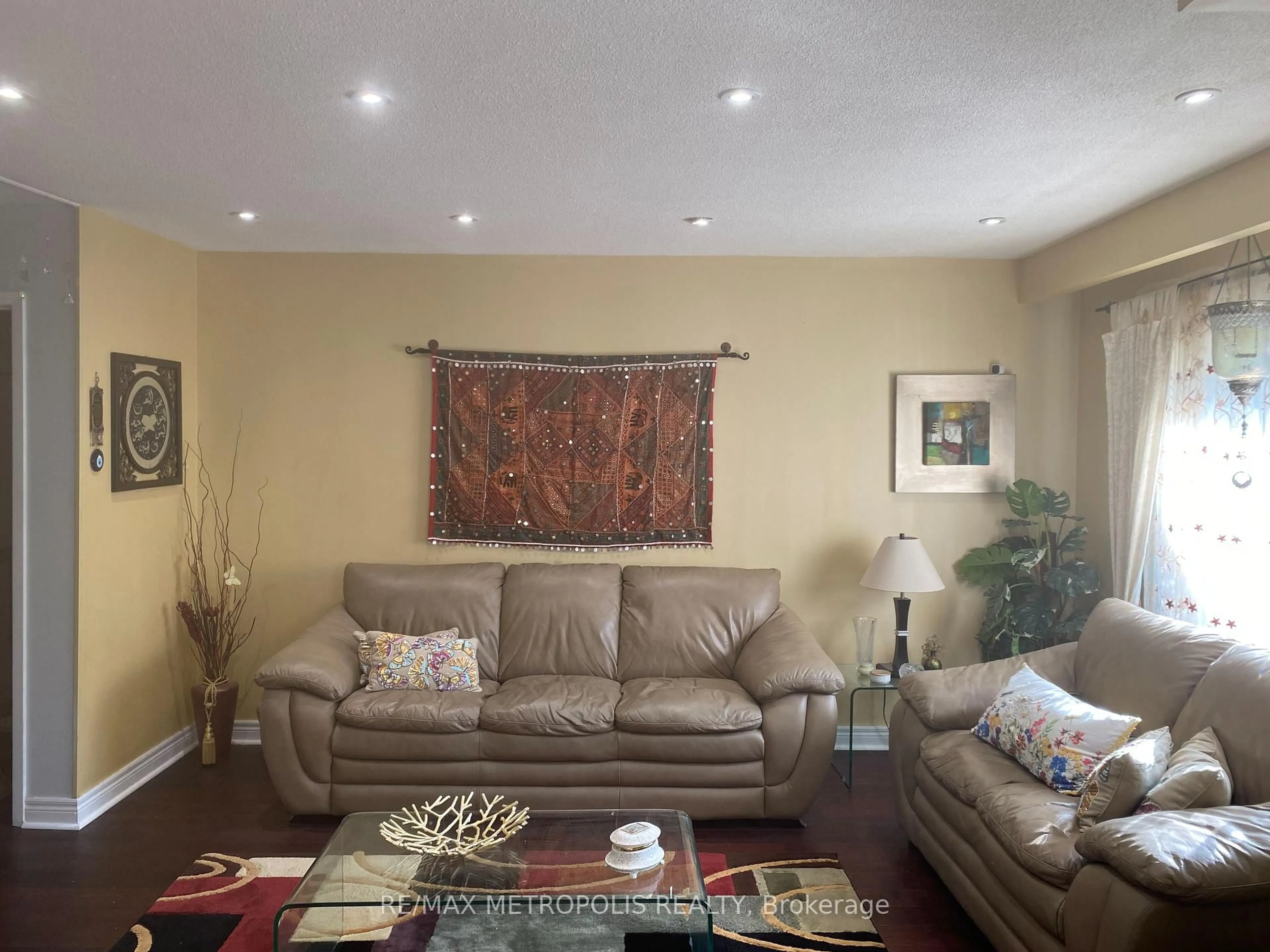 Living room with furniture, wood/laminate floor for 80 Orsett St, Oakville Ontario L6H 2N9
