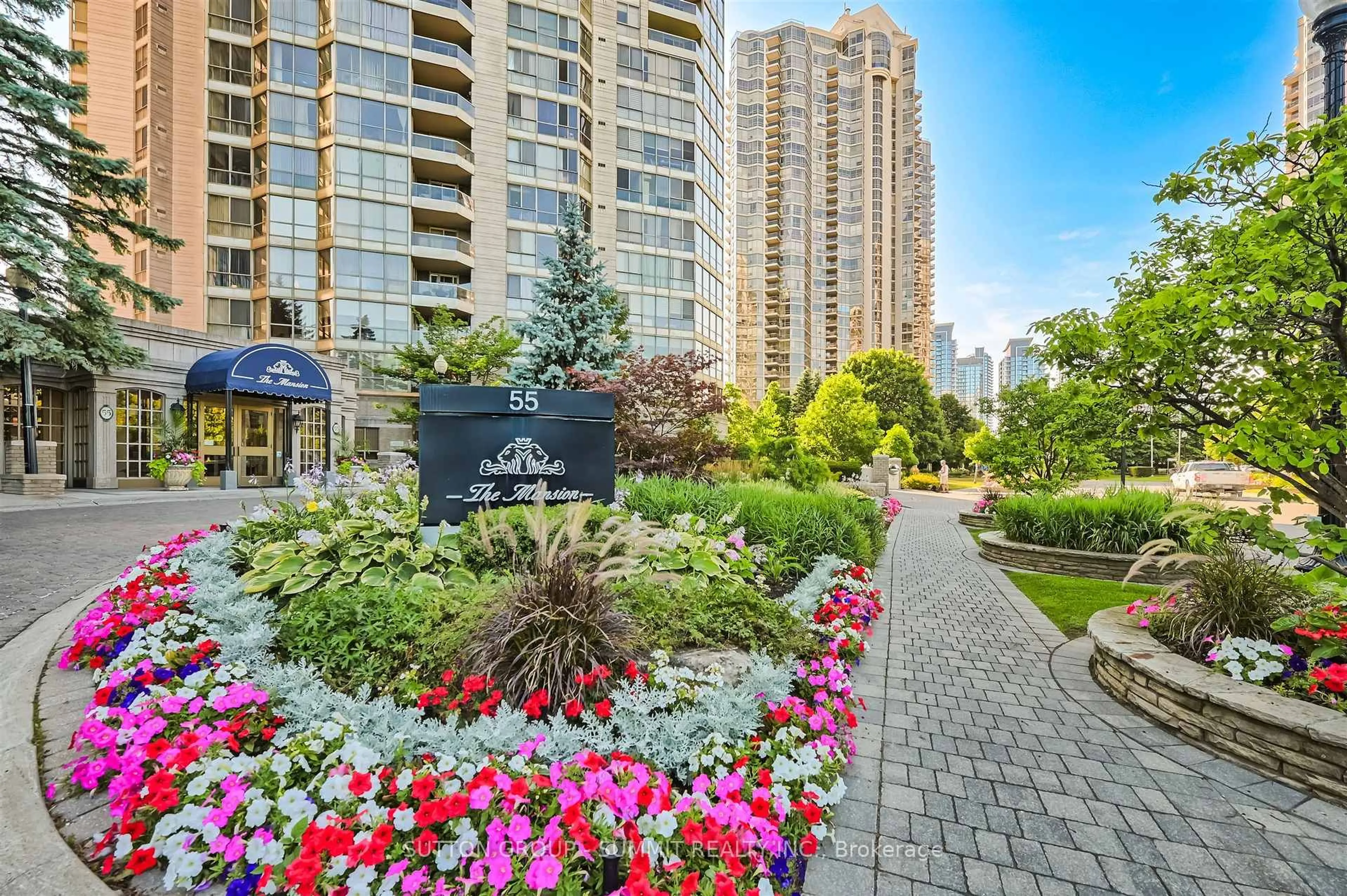Patio, city buildings view from balcony for 55 Kingsbridge Garden Circ #209, Mississauga Ontario L5R 1Y1