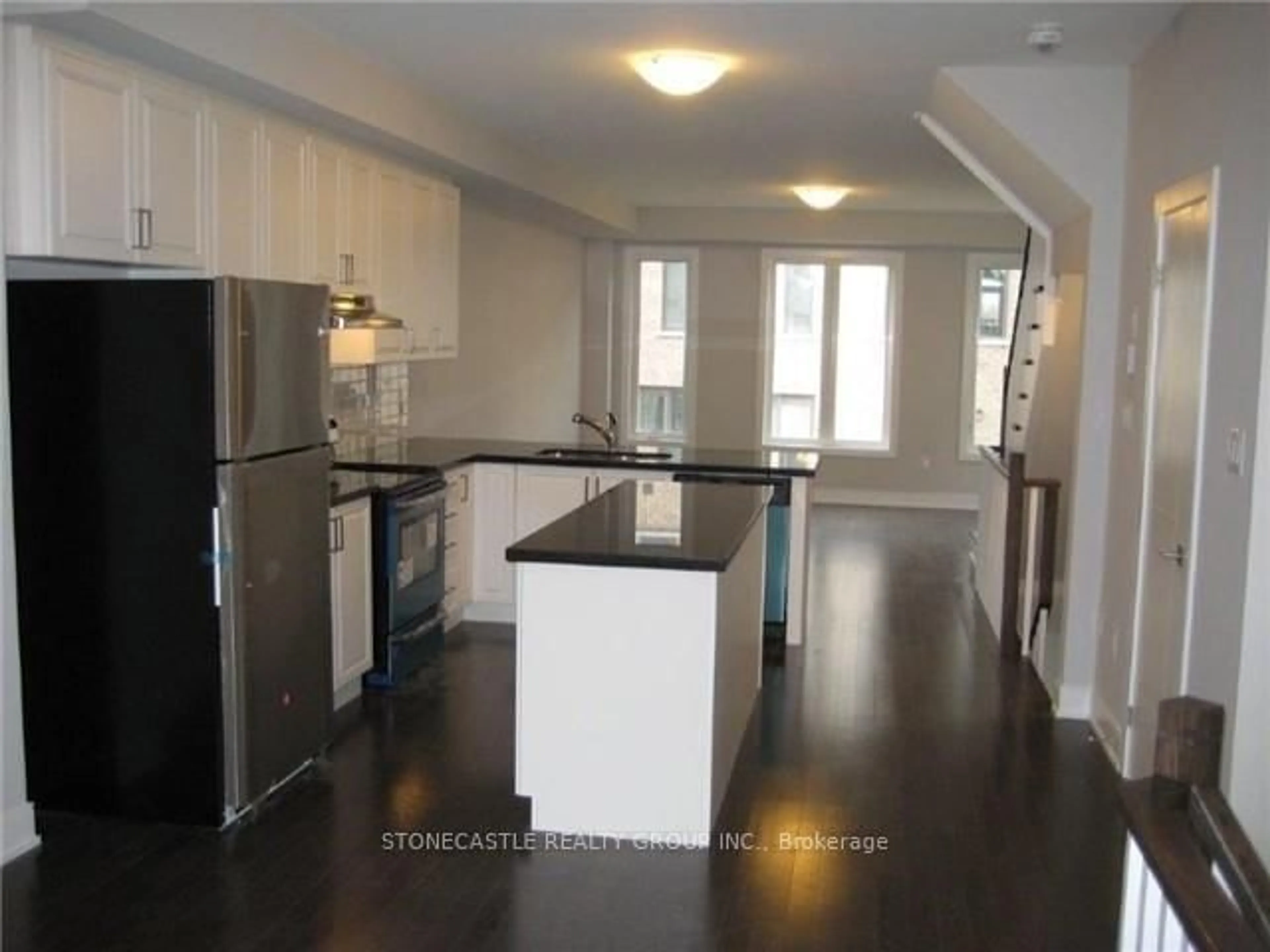 Open concept kitchen, wood/laminate floor for 1145 Beachcomber Rd, Mississauga Ontario L5G 0B4