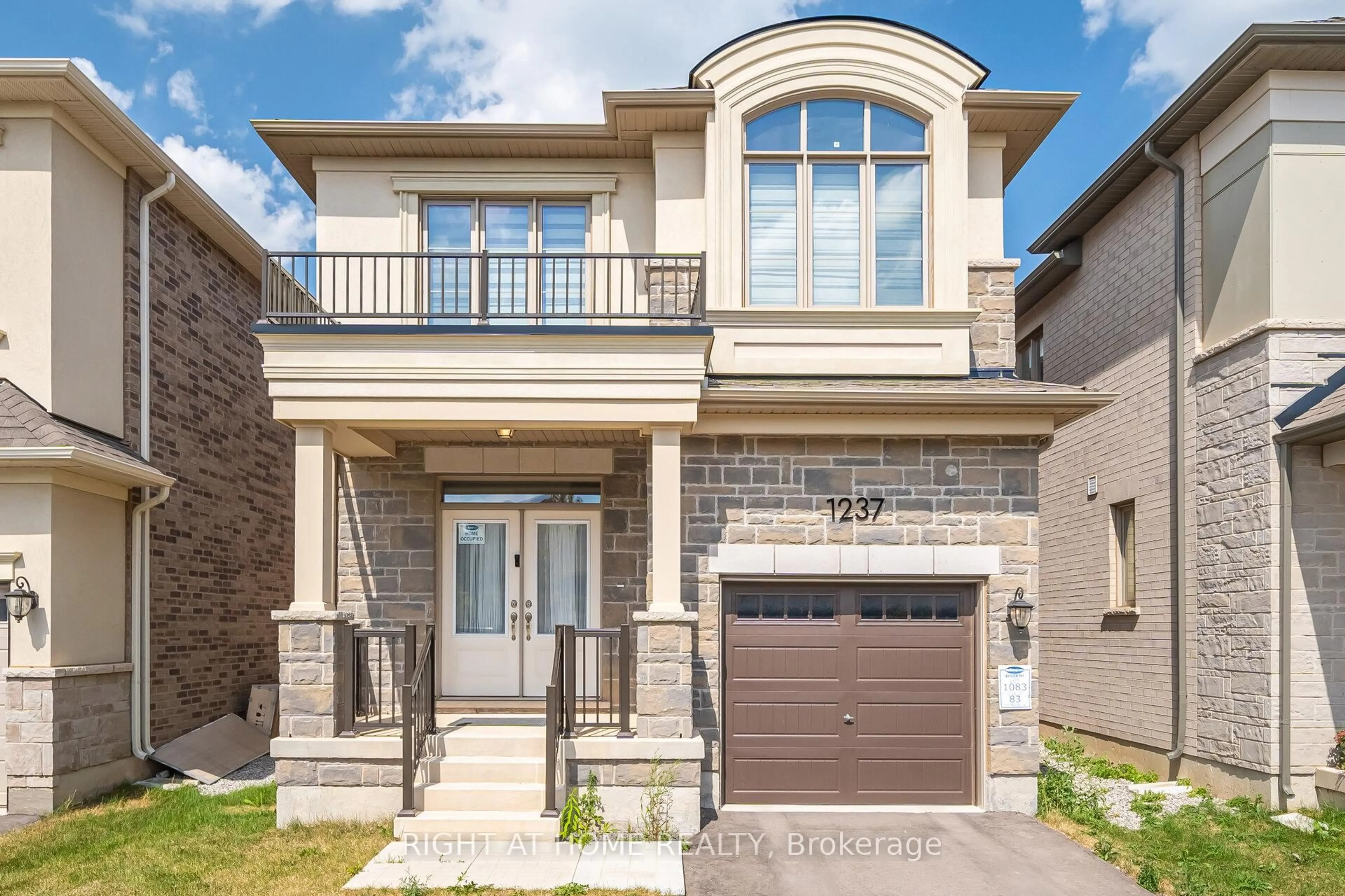 Home with brick exterior material, street for 1237 Trudeau Dr, Milton Ontario L9E 1Y6