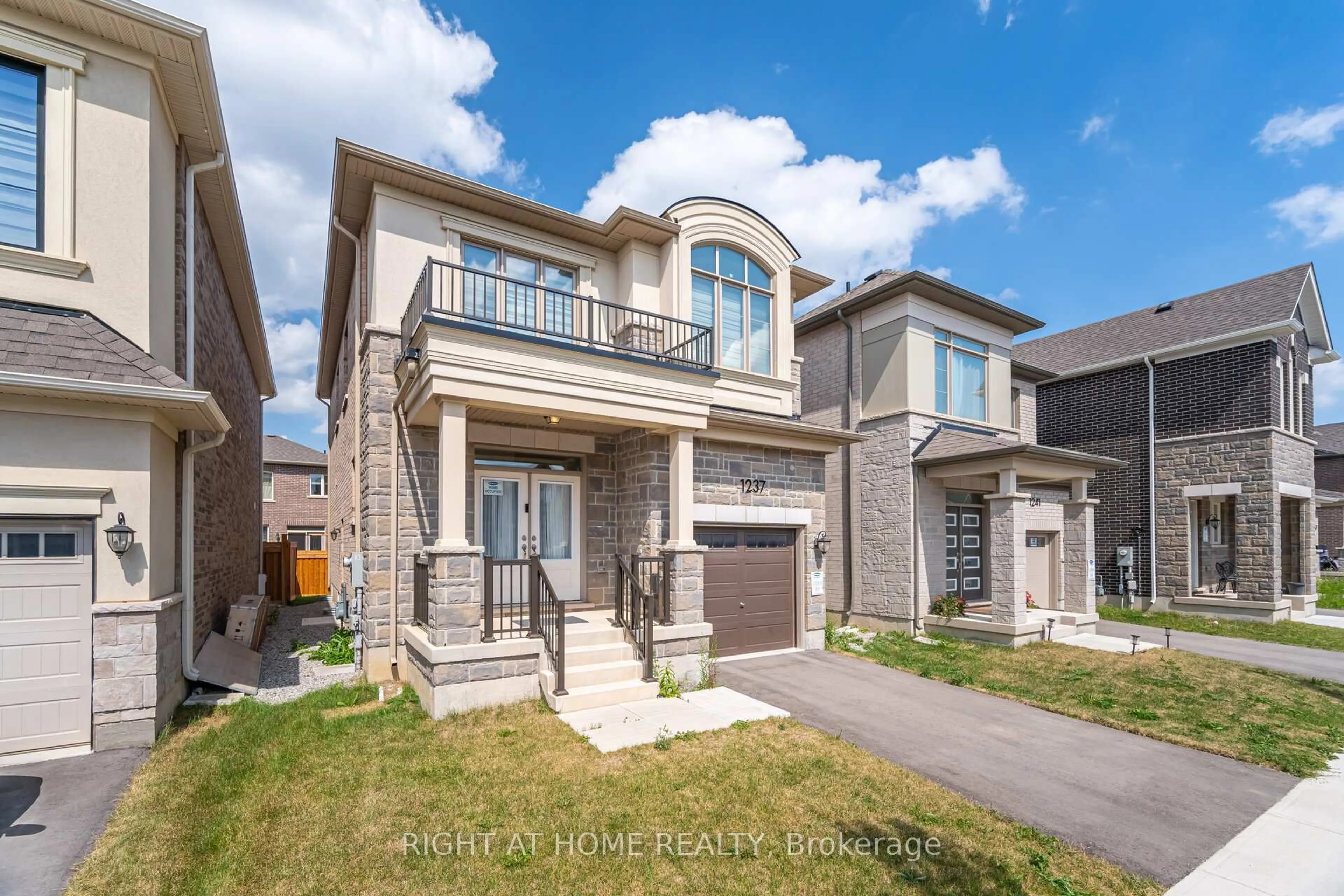 Home with brick exterior material, street for 1237 Trudeau Dr, Milton Ontario L9E 1Y6