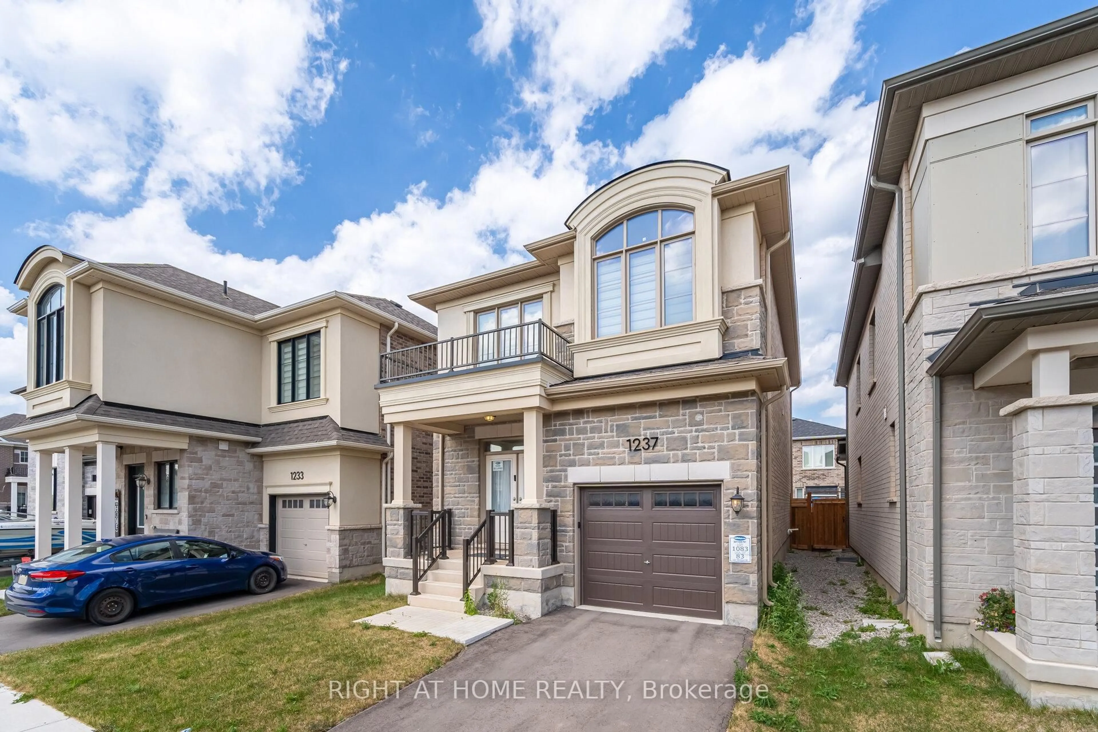Home with brick exterior material, street for 1237 Trudeau Dr, Milton Ontario L9E 1Y6