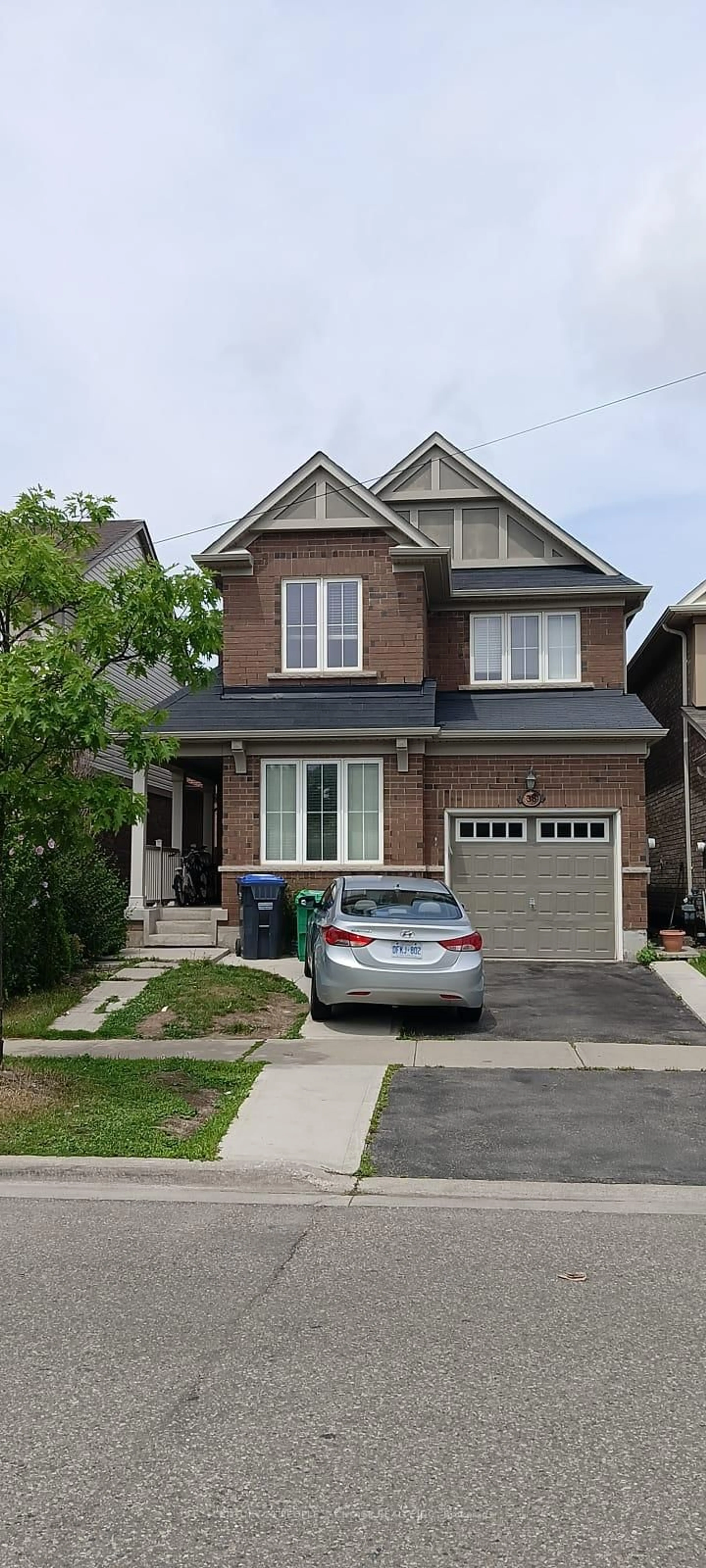 Home with brick exterior material, street for 38 Aylesbury Dr, Brampton Ontario L7A 0S5