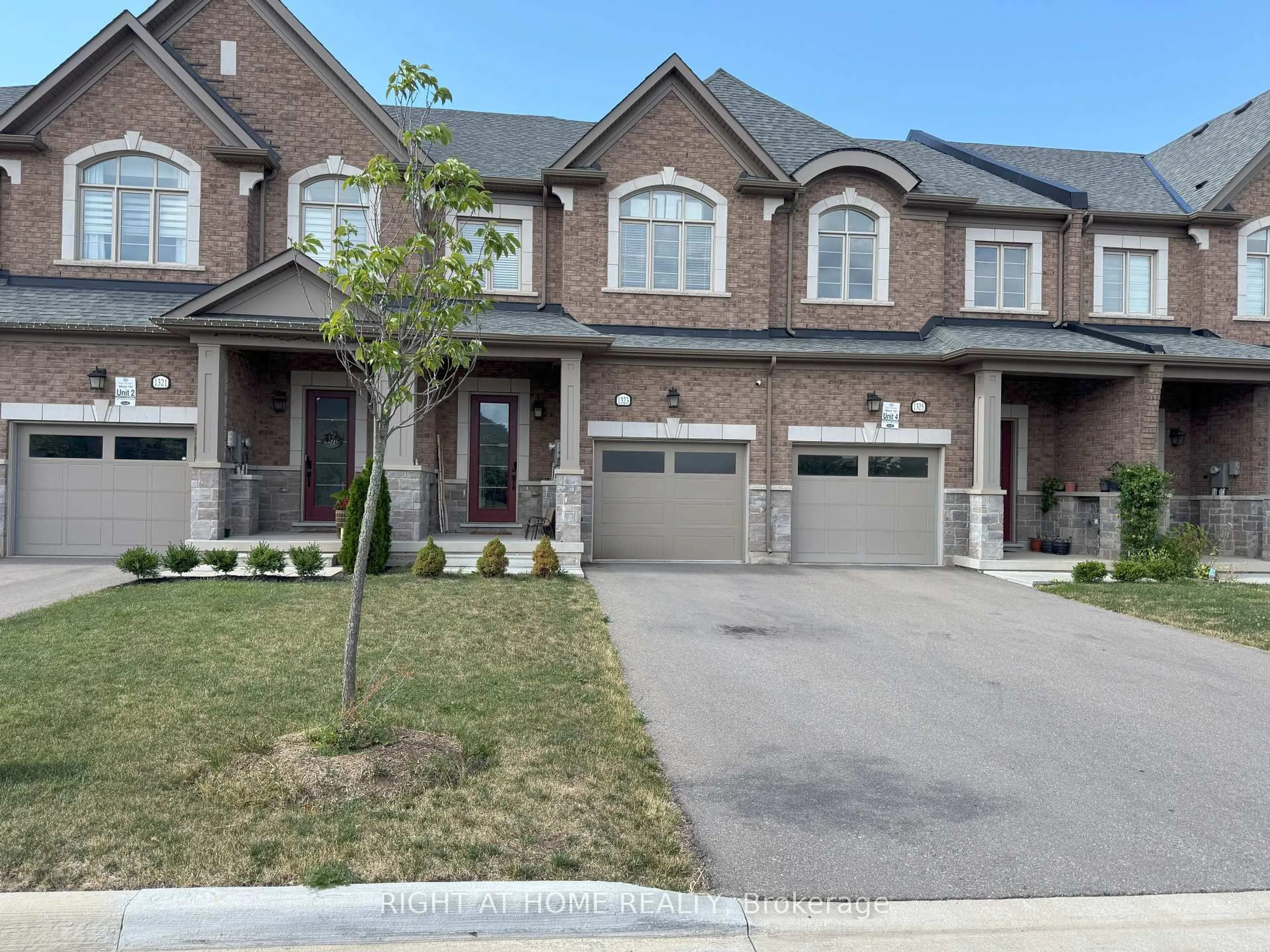Home with brick exterior material, street for 1323 Chee Chee Landing, Milton Ontario L9E 1L3