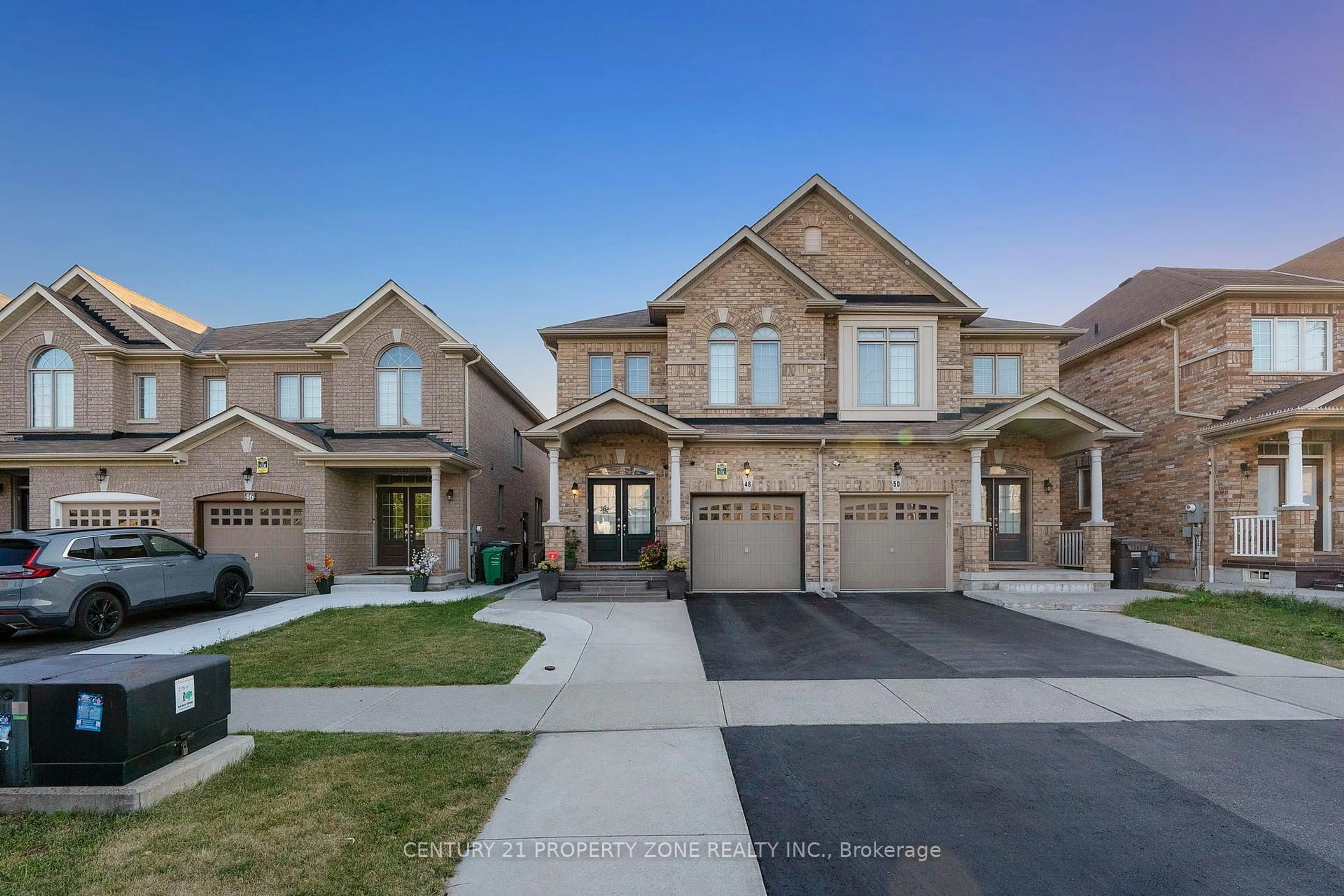 Home with brick exterior material, street for 48 Durango Dr, Brampton Ontario L6X 5H3