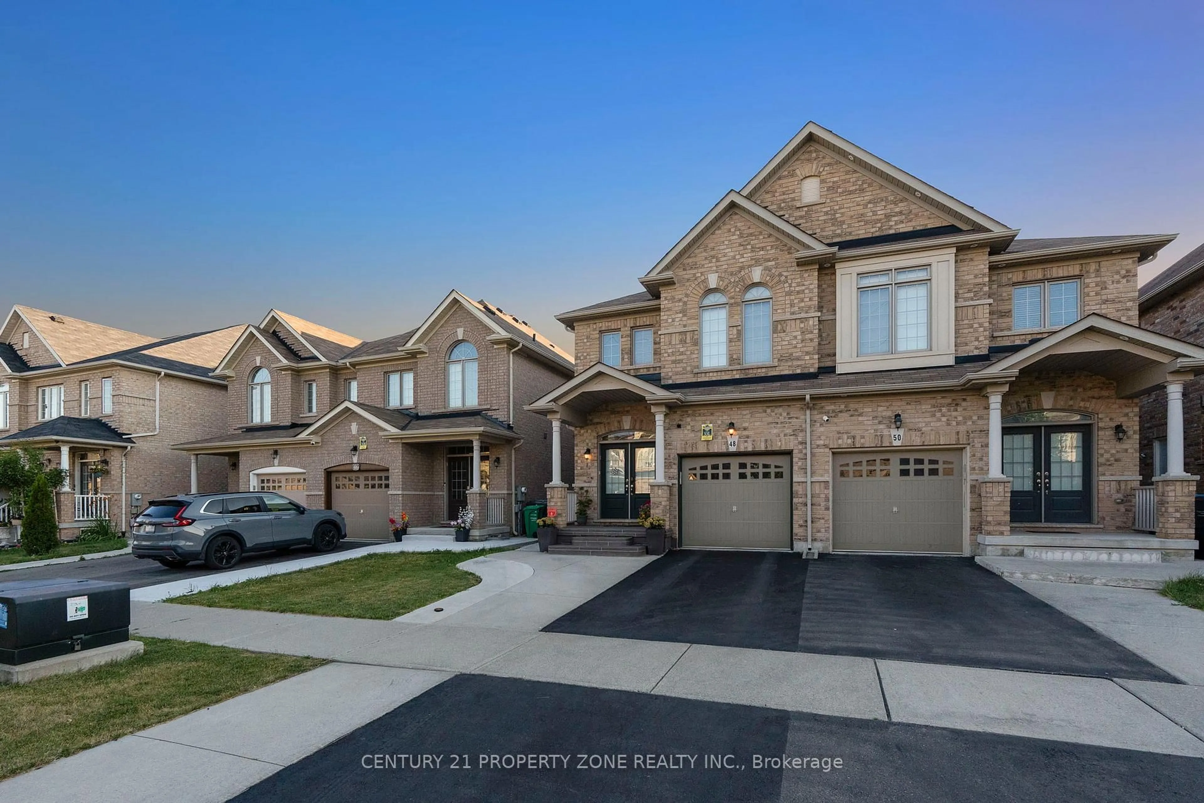 Home with brick exterior material, street for 48 Durango Dr, Brampton Ontario L6X 5H3