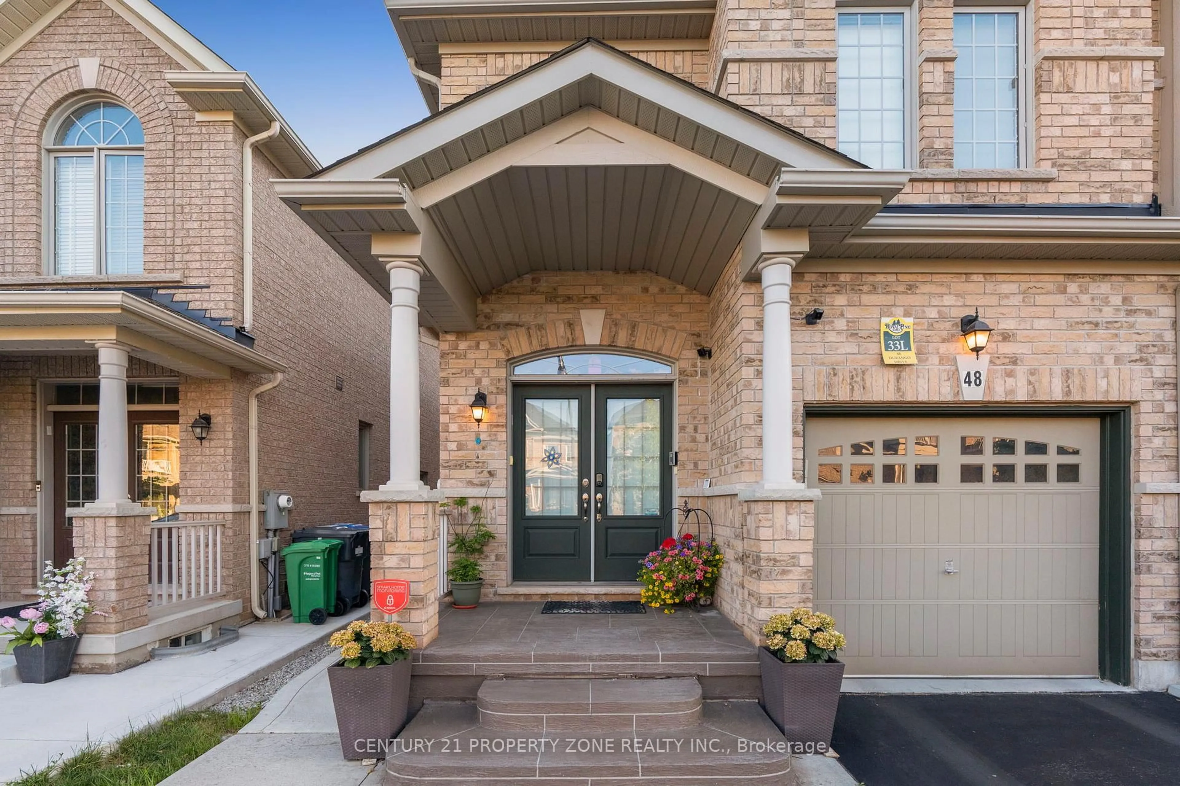 Home with brick exterior material, street for 48 Durango Dr, Brampton Ontario L6X 5H3