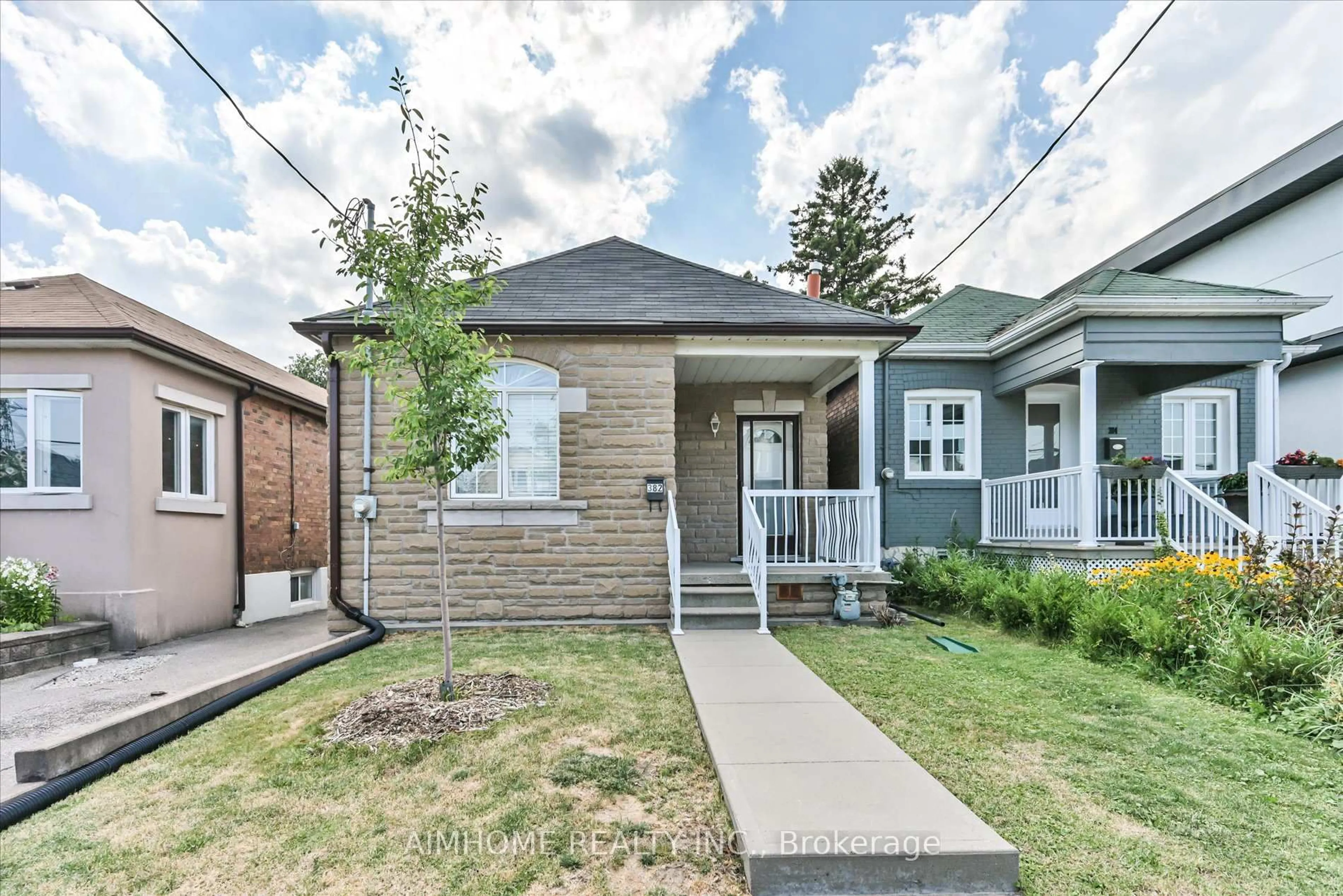 Home with brick exterior material, street for 382 Blackthorn Ave, Toronto Ontario M6M 3B9