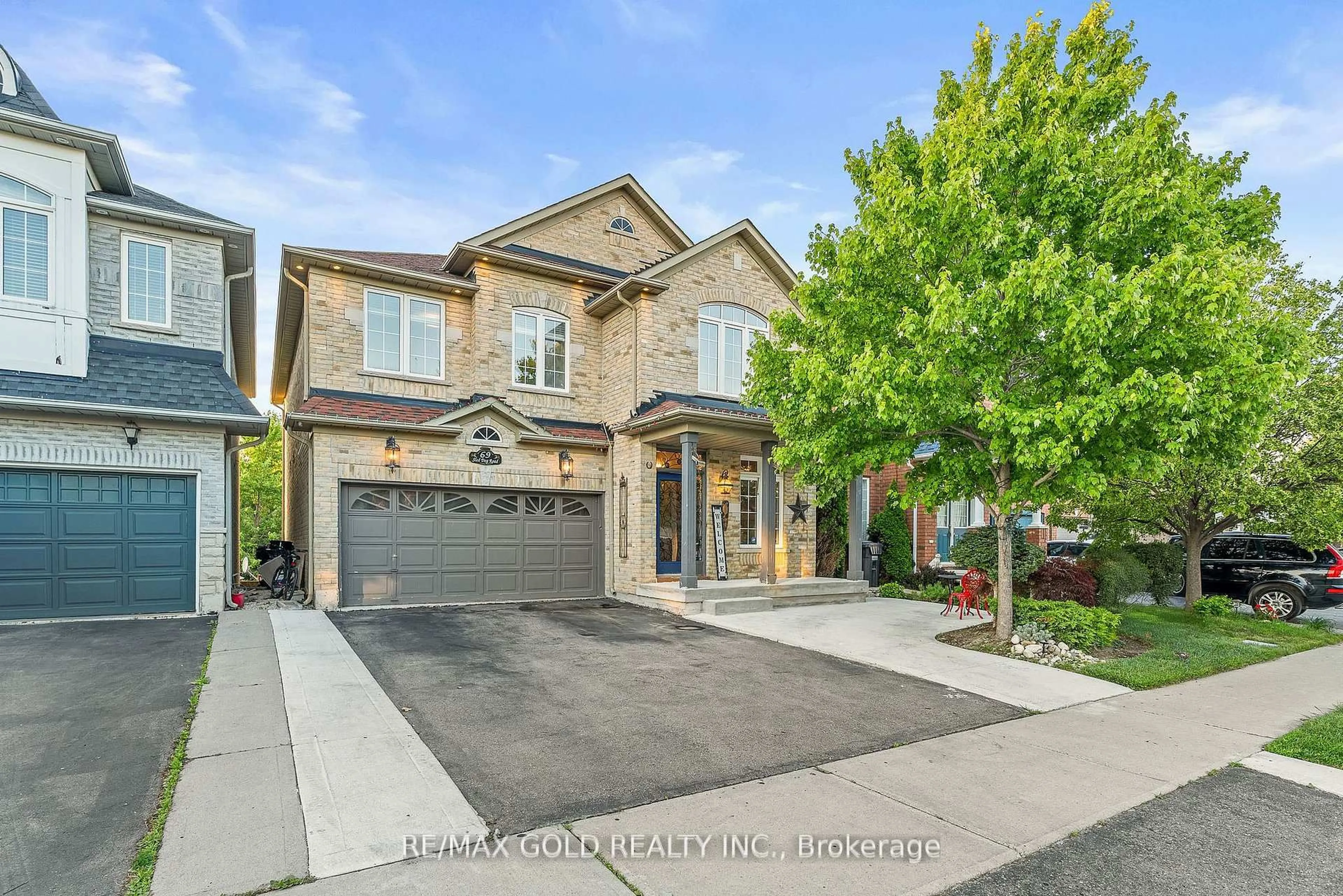 Home with brick exterior material, street for 69 Sled Dog Rd, Brampton Ontario L6R 0J7